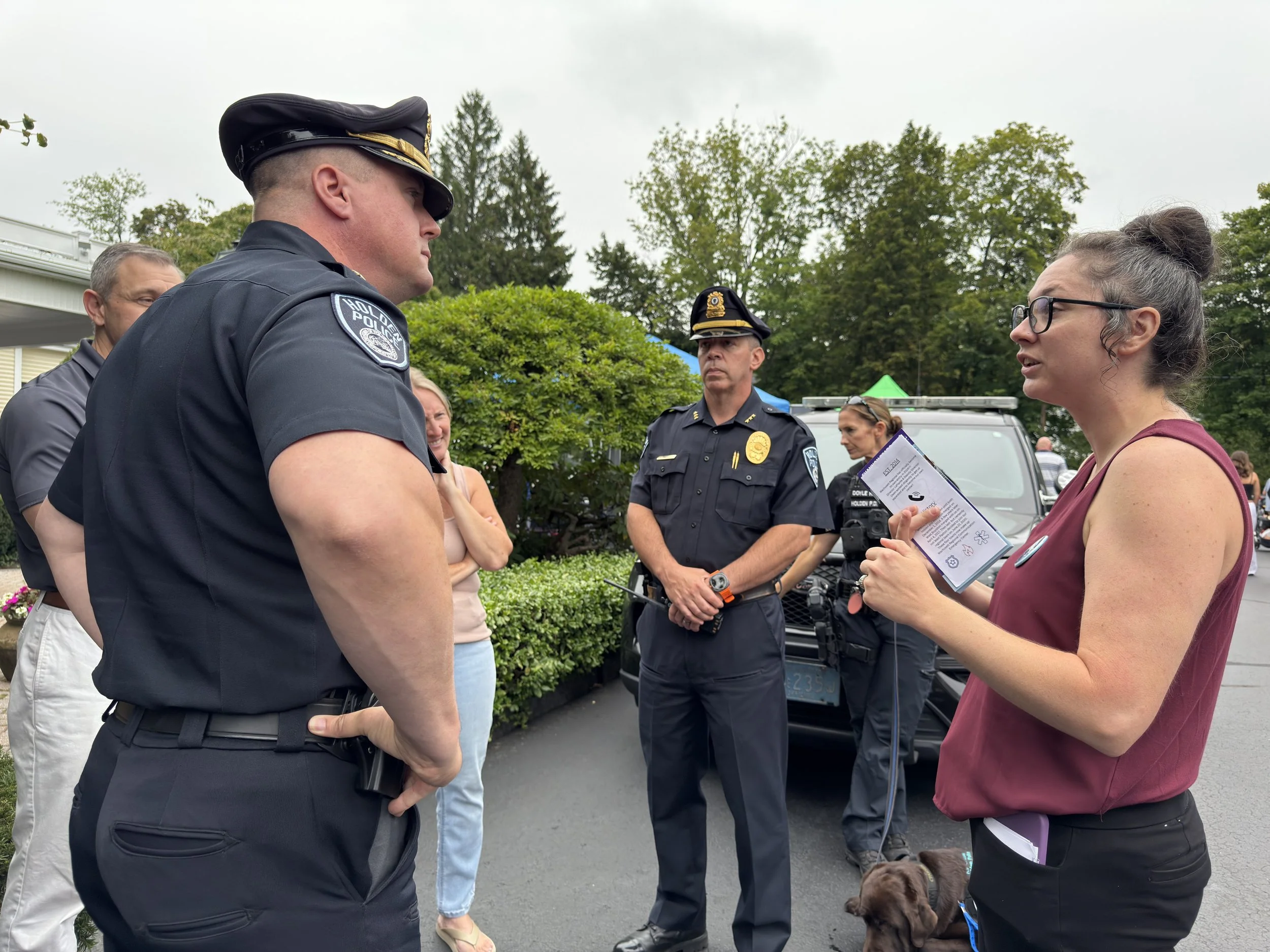 Speaking with officers of the Holden Police Department at Holden Days. 