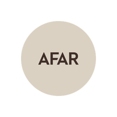 A circular logo with the word 'AFAR' in the center on a light background.