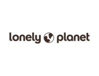 Logo of Lonely Planet with black text and a small globe icon between the words.