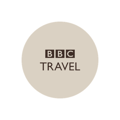 BBC Travel logo with a beige circle and black text.