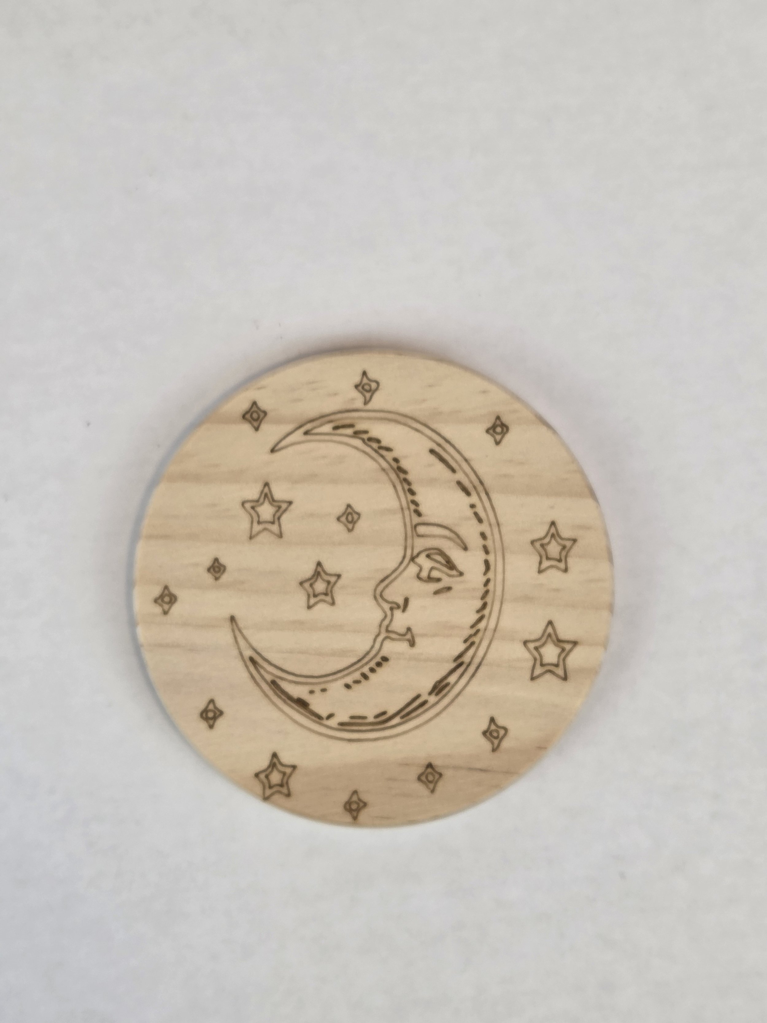 Laser-engraved coasters, natural wood finish, moon and stars