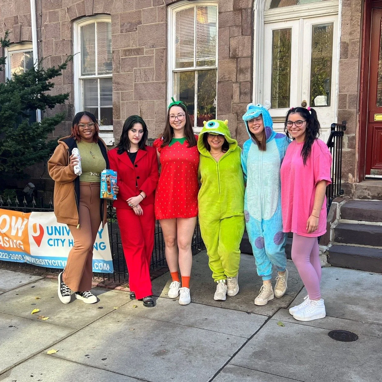 Our office celebrated Halloween by dressing up in some of their favorite characters. Let us know which are your favorites!🎃

Costumes from left to right: Shaggy, The Joker, a Strawberry, Mike Wazowski, Sully, &amp; Boo.

#universitycityhousing #happ