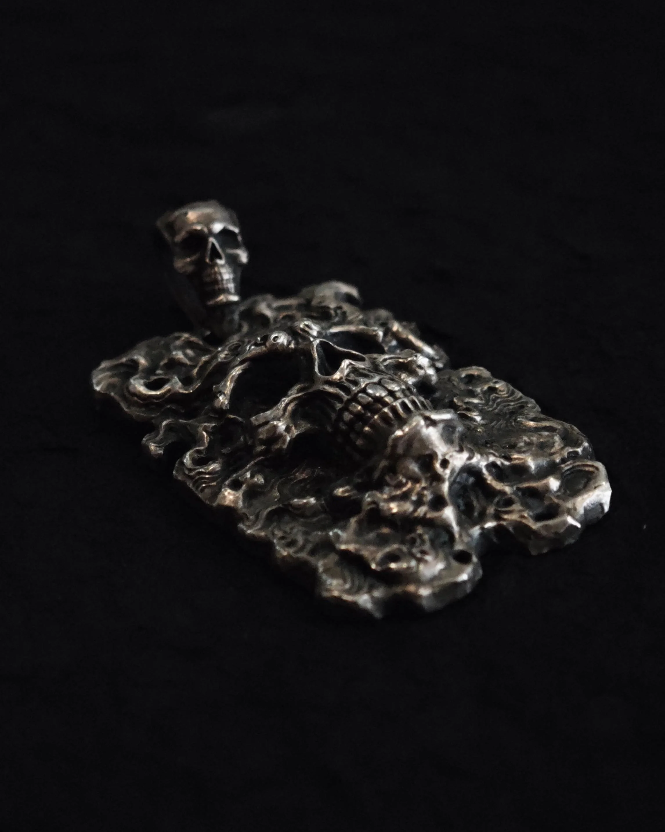 Xia Penghao FireYa Abyssal Reawakening Pendant - Side profile on tabletop