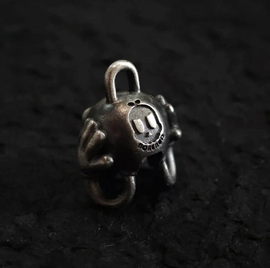 Xia Penghao BONE BUD THREE SENSES DEAF Pendant - Rear angle showing BONE BUD skull logo on back