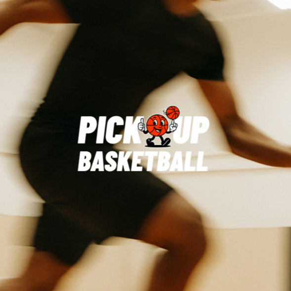 Blurred image of a person sitting on a beige couch, holding a basketball. Centered overlay text with a cartoon basketball character saying 'Pick Up Basketball'.