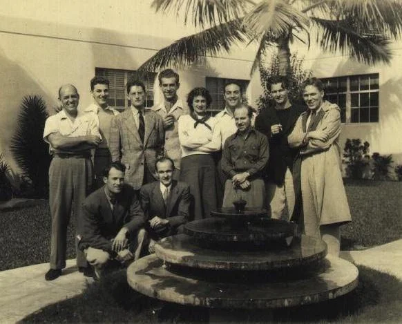 Fleischer Staff pose by the fountain at the Miami Studio