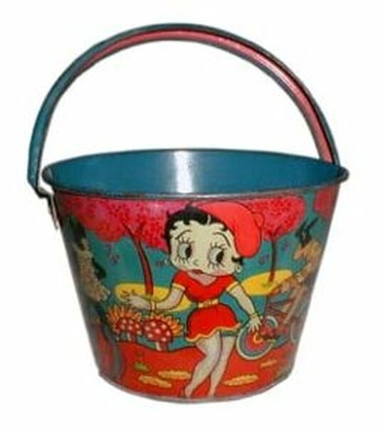 1930s Tin Litho Pail – Betty walks in a surreal garden while a dog-like creature rides by on a bike. Manufacturer unknown. Marked “Made In Japan.” Very Rare.