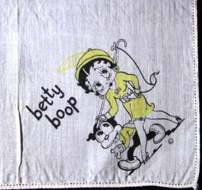 Detail from corner of handkerchief which is 9 inches square and made of thin cotton with sewn edges all around. There is a different image of Betty Boop in each corner.