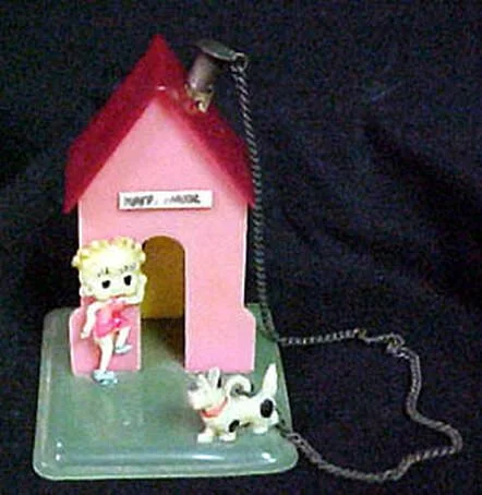 1930s Pencil Holder – the doorway that reads “Happy House.” There is a hole where the chimney might be that holds a pencil. The Manufacturer is unknown. There are no dates or markings. Made in Japan. Very Rare.