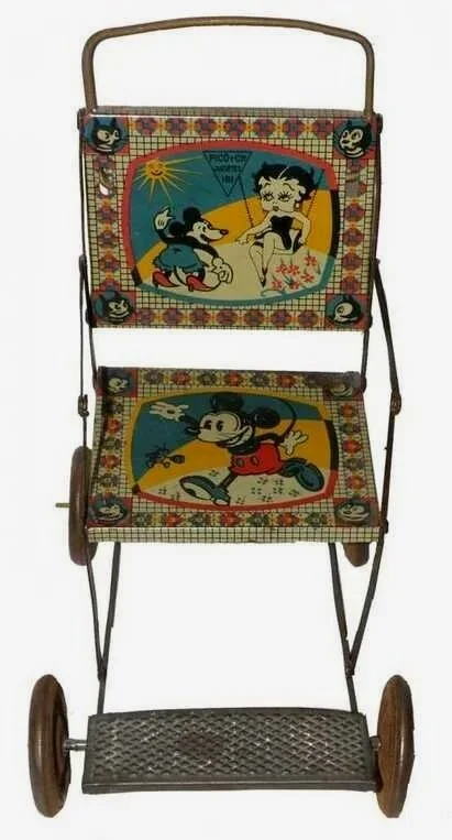 This doll-sized stroller was made in Spain in the 1930s.
