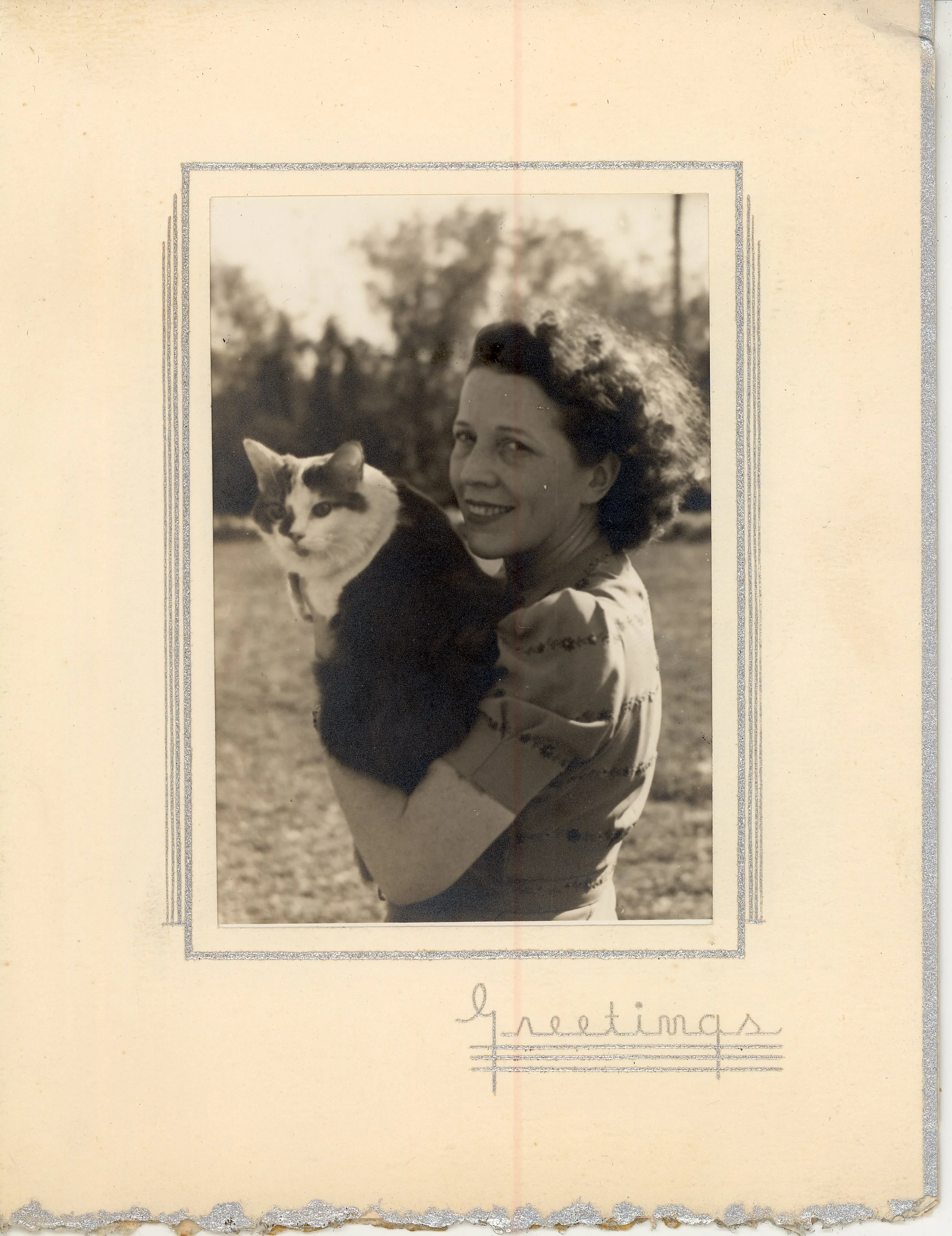 Vera Coleman came to Fleischer Studios in 1926 as a typist and telephone operator. She quickly moved into the position of Max’s secretary, and worked with him throughout his career. Vera, shown here with her cat 'Russy,' was known for her great love 