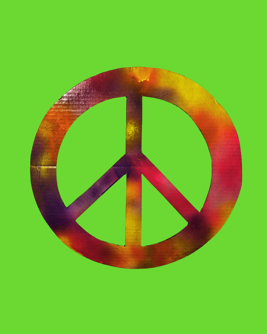 Colorful peace symbol on a bright green background.