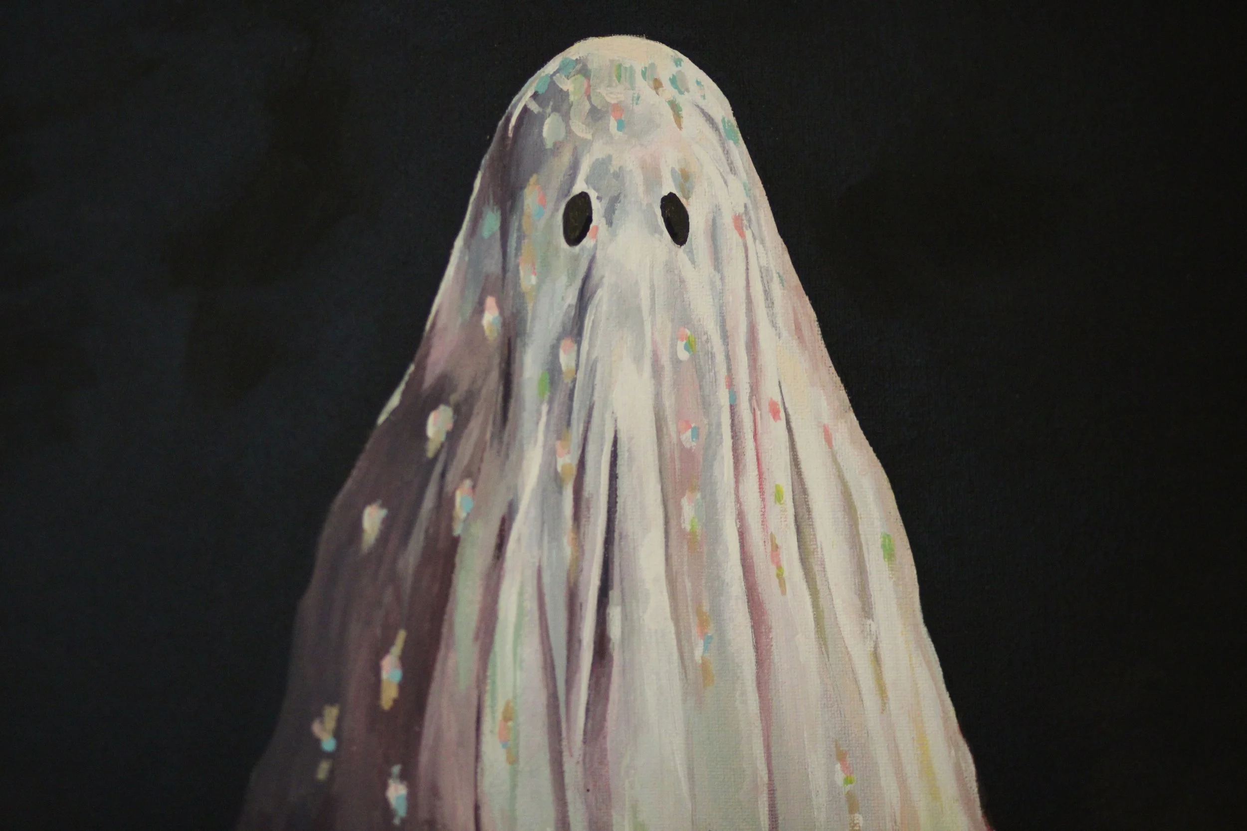 A painting of a ghost with a white sheet, two eye holes, and colorful speckles on the sheet against a black background.