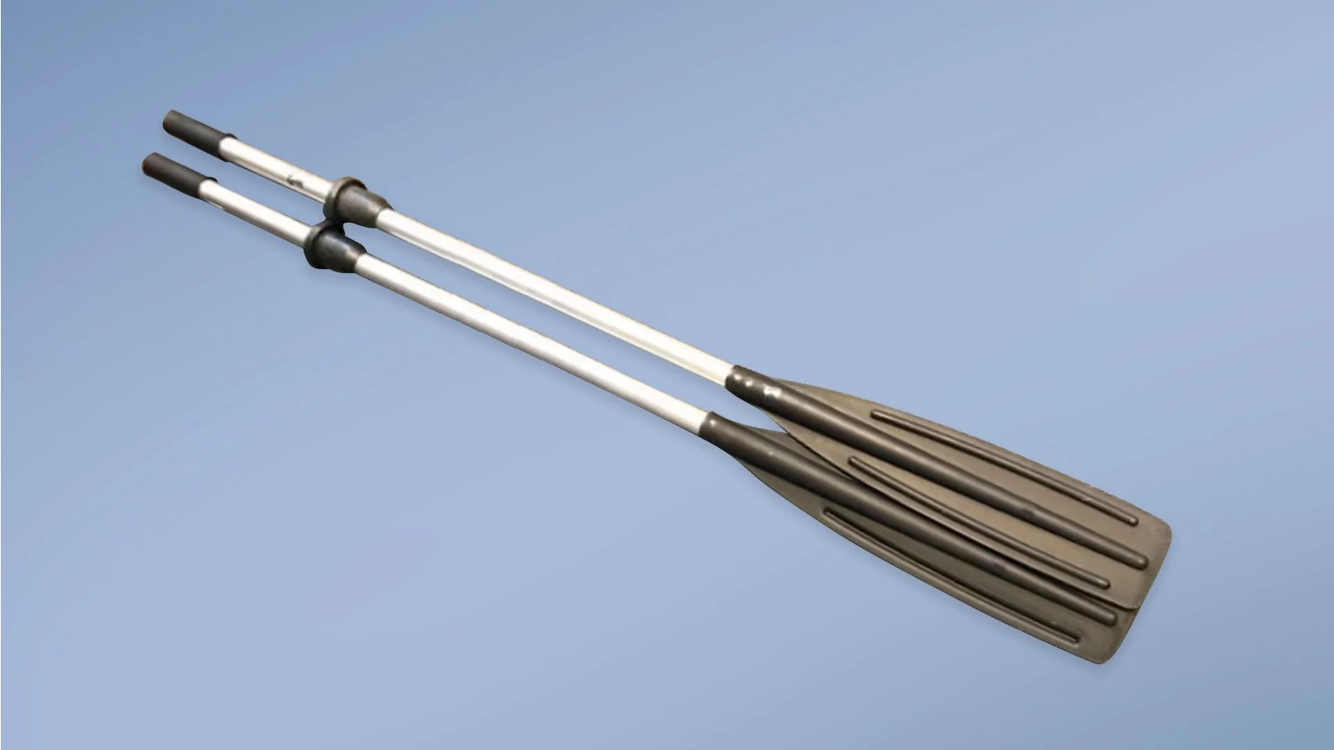 A pair of boat paddles with black handles and white shafts on a light blue background.