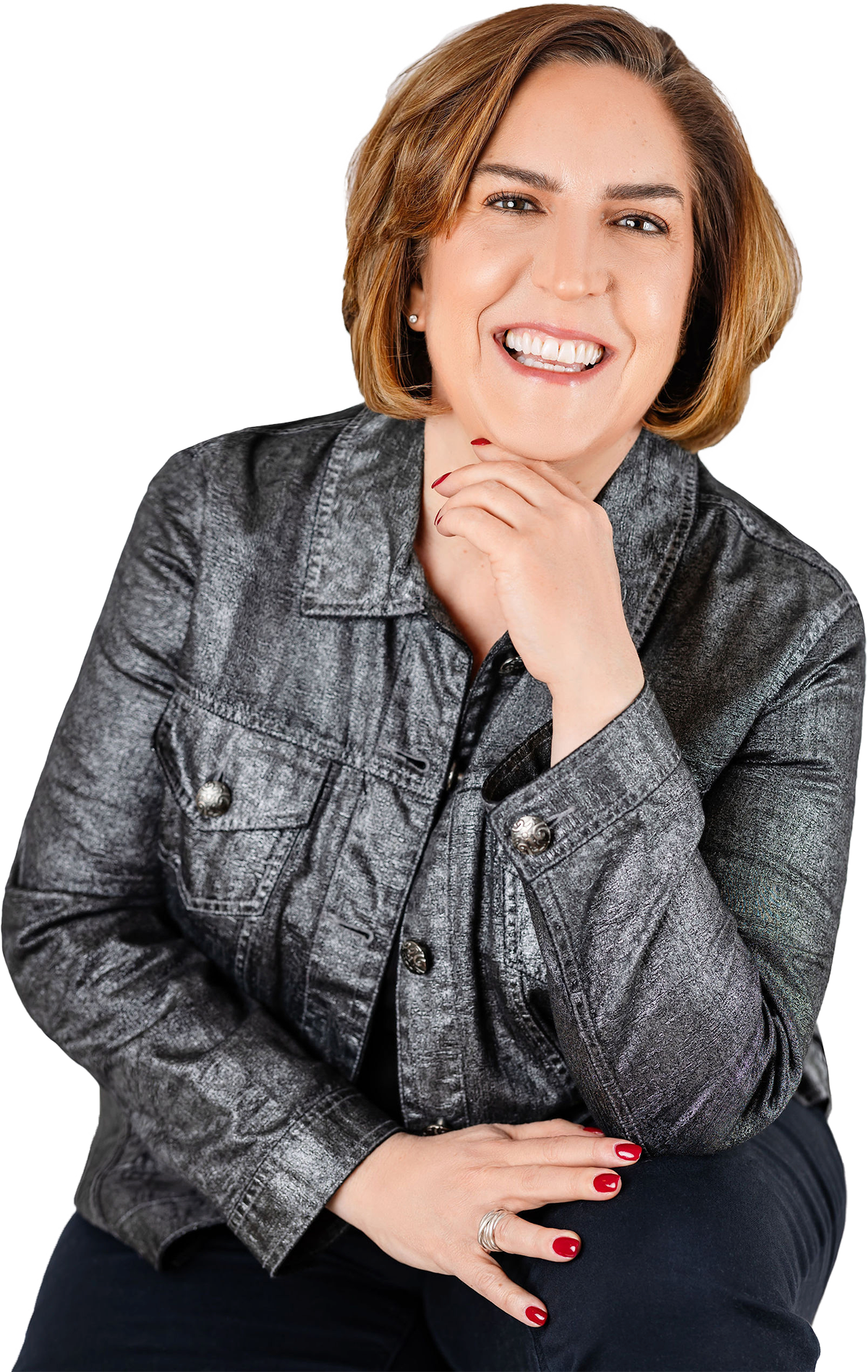 Kara Curtis smiling headshot on a light gray background