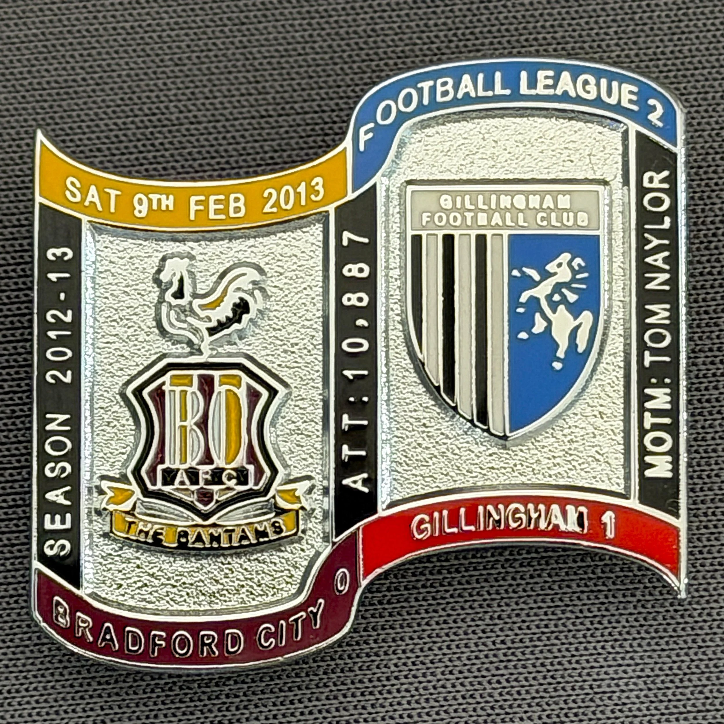Reference Number: BCFIX153
Size: H 26.9 mm x W 29.2 mm
Pin Type: Brooch Pin
Plating: Chrome
Value: £10
Manufacturer: Bradford City Badges
Comments: Bradford City v Gillingham  2012/13 Limited Edition 10 Badges (Silver Version)