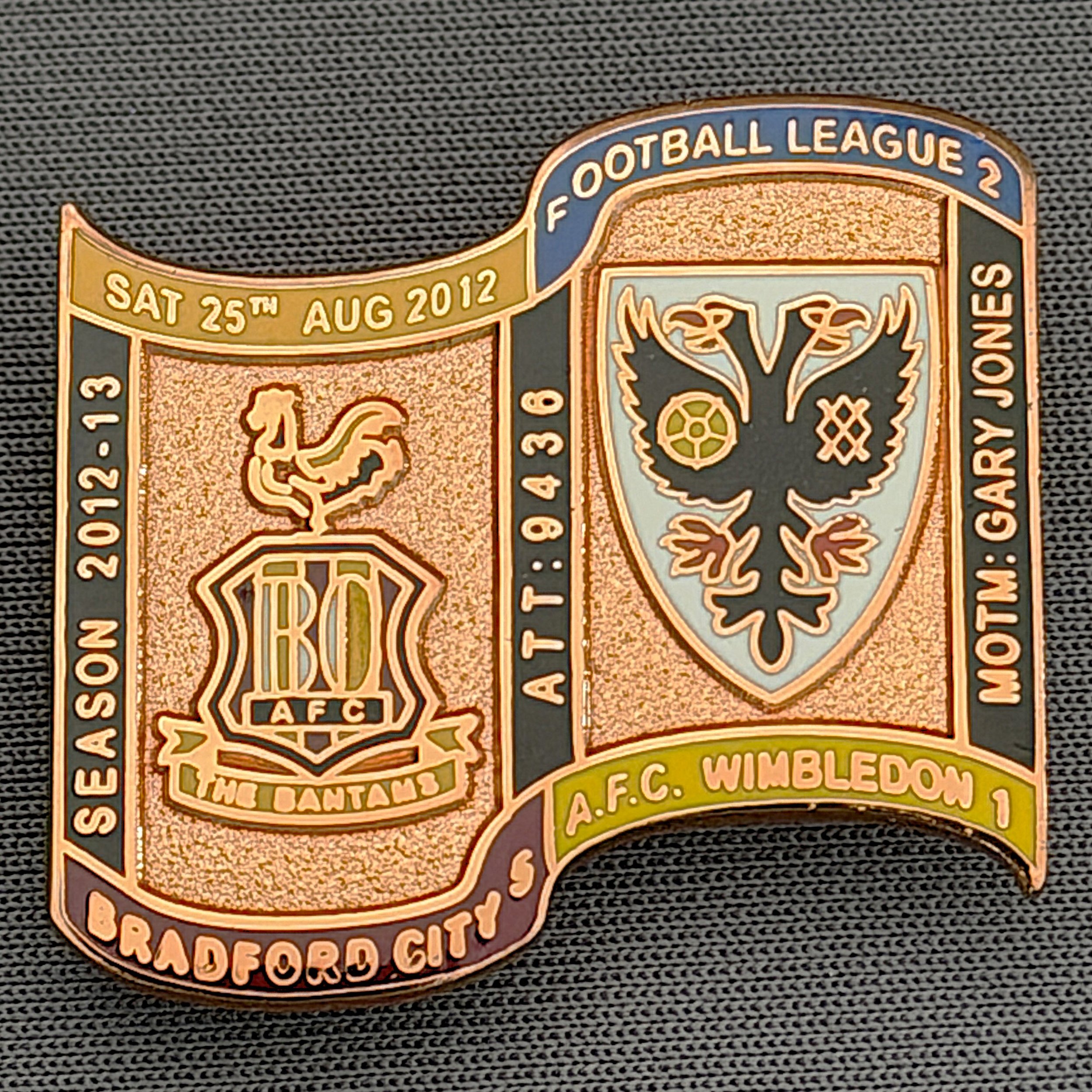 Reference Number: BCFIX163
Size: H 26.9 mm x W 29.2 mm
Pin Type: Brooch Pin
Plating: Copper
Value: £12
Manufacturer: Bradford City Badges
Comments: Bradford City v A.F.C. Wimbledon  2012/13 Limited Edition 1 Badge (Copper Version)