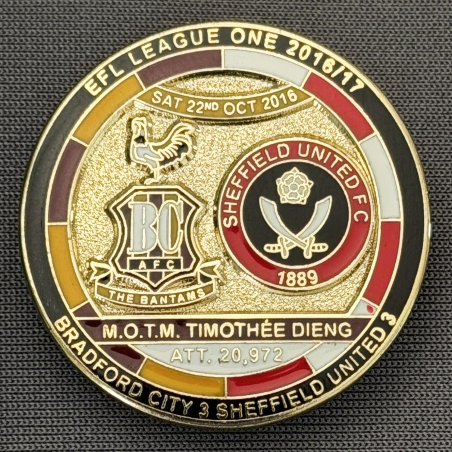 Reference Number: BCFIX376
Size: D 29.4 mm
Pin Type: Brooch Pin
Plating: Gold
Value: £8
Manufacturer: Bradford City Badges
Comments: Bradford City v Sheffield United 2015/16, Limited Edition of 50 Badges (Gold Version)