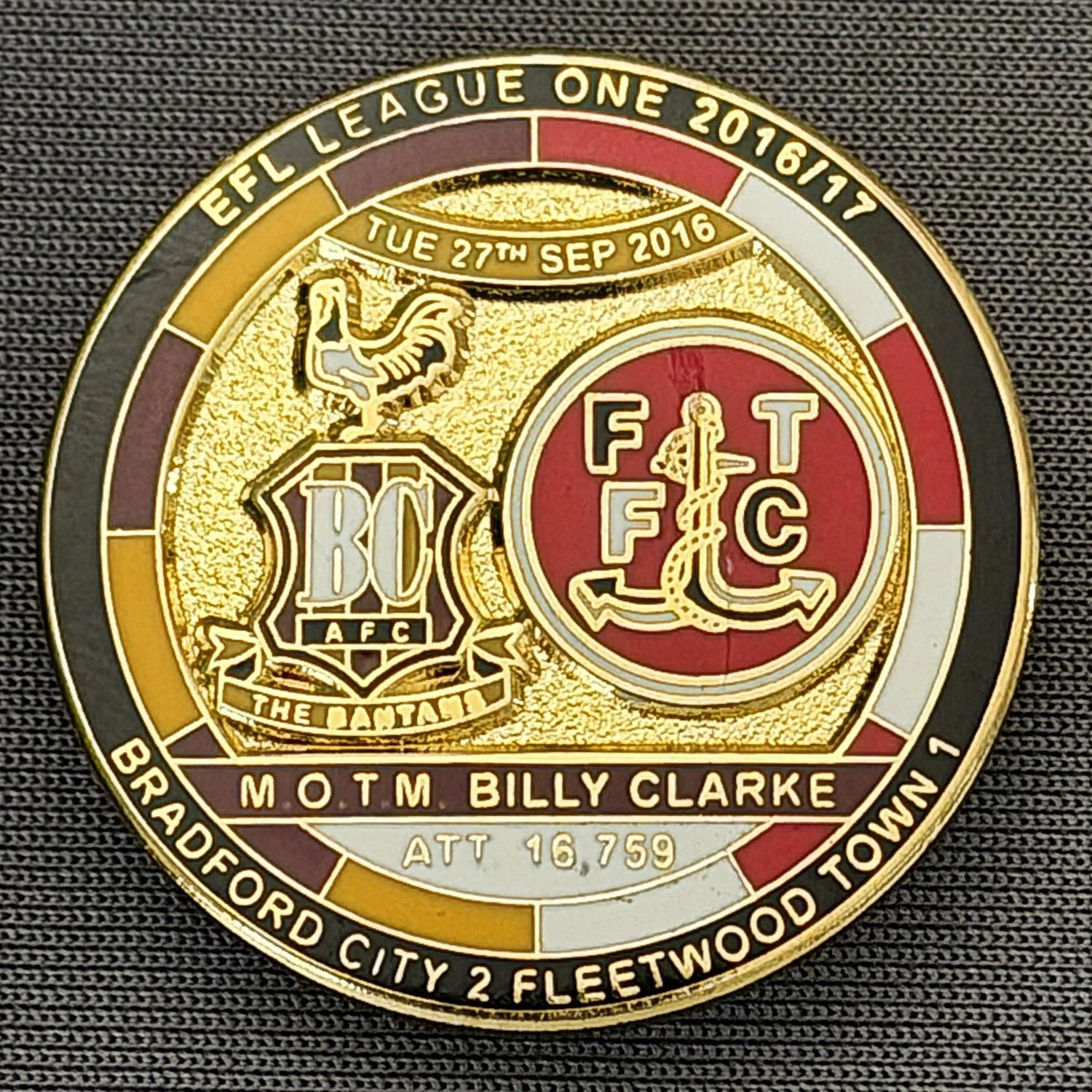 Reference Number: BCFIX373
Size: D 29.4 mm
Pin Type: Brooch Pin
Plating: Gold
Value: £8
Manufacturer: Bradford City Badges
Comments: Bradford City v Fleetwood Town 2015/16, Limited Edition of 50 Badges (Gold Version)
