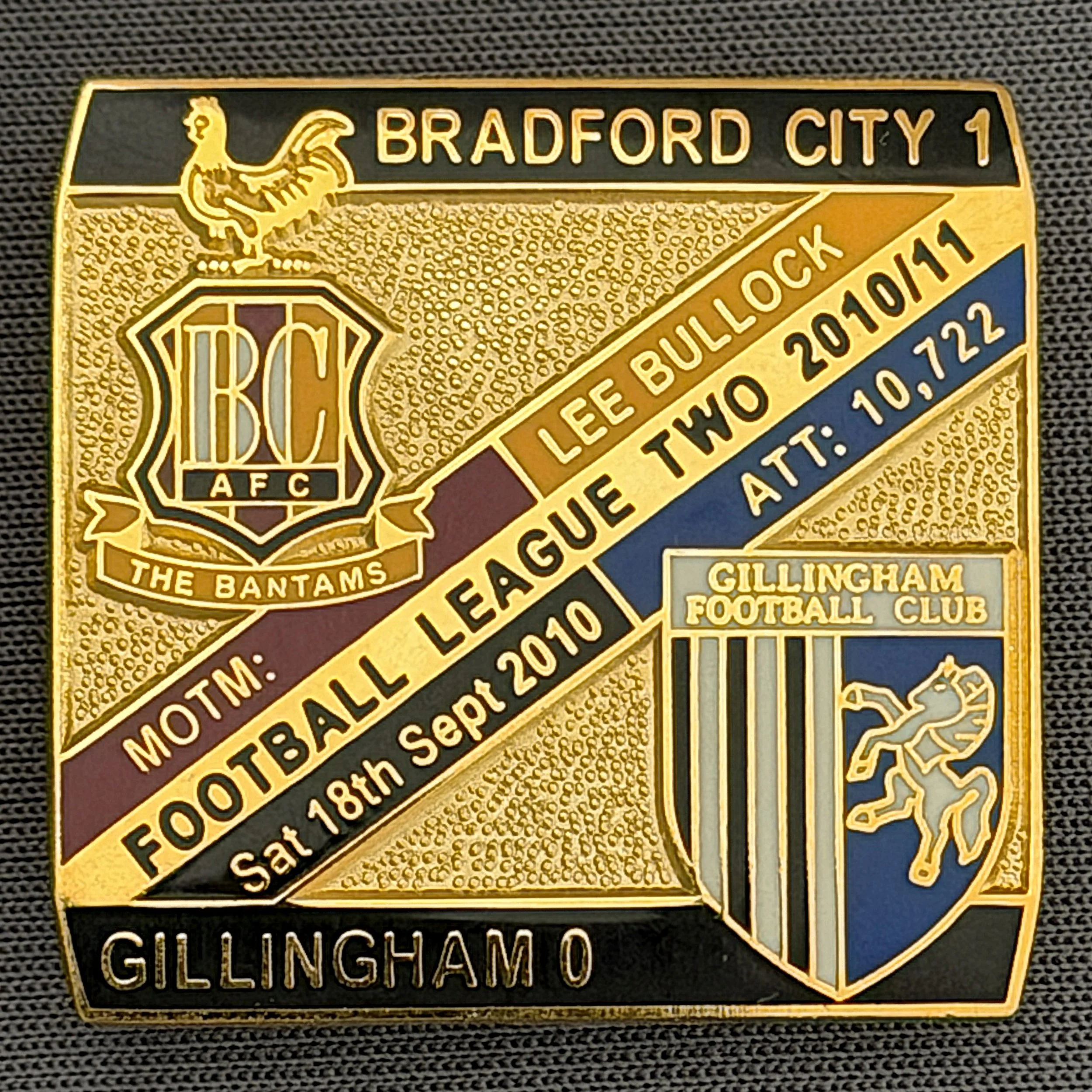 Reference Number: BCFIX050
Size: H 28.3 mm x W 29.3 mm
Pin Type: Brooch Pin
Plating: Gold
Value: £8
Manufacturer: Bradford City Badges
Comments: Bradford City v Gillingham  2010/11 Limited Edition 100 Badges