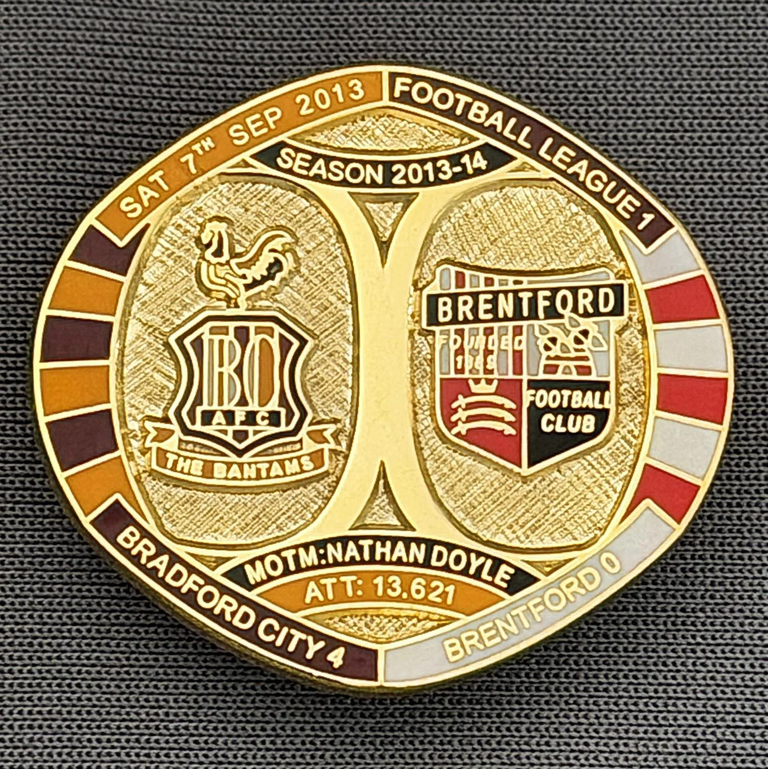 Reference Number: BCFIX187
Size: H 26.3 mm x W 28.9 mm
Pin Type: Brooch Pin
Plating: Gold
Value: £8
Manufacturer: Bradford City Badges
Comments: Bradford City v Brentford 2013/14 Limited Edition 55 Badges