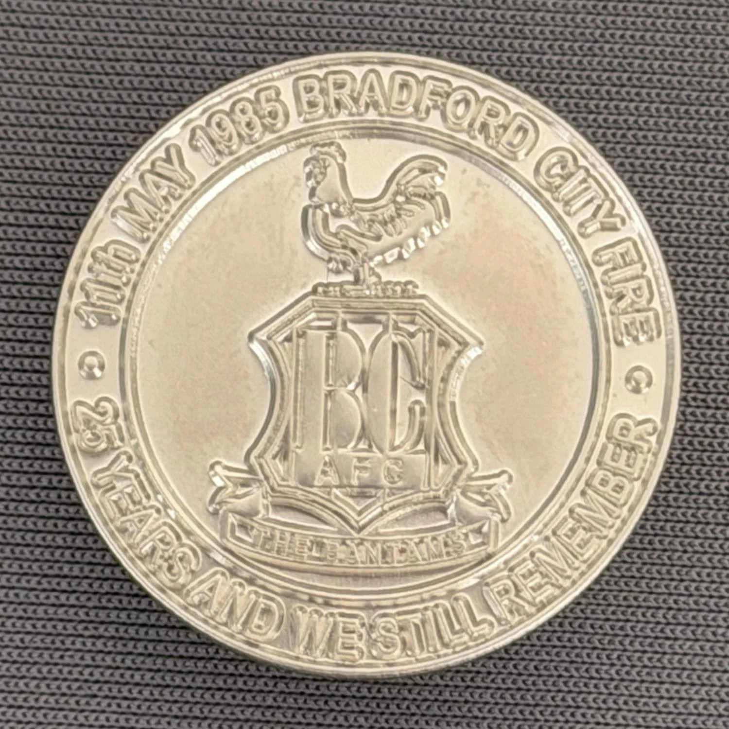 Reference Number: BCFIR000
Size: D 25 mm
Pin Type: Metal Clutch
Plating: Matt Silver
Value: £12
Manufacturer: Bradford City Badges
Comments: Limited Edition of 56 to raise additional money for Bradford Burns Unit.  Sold as set of 4.