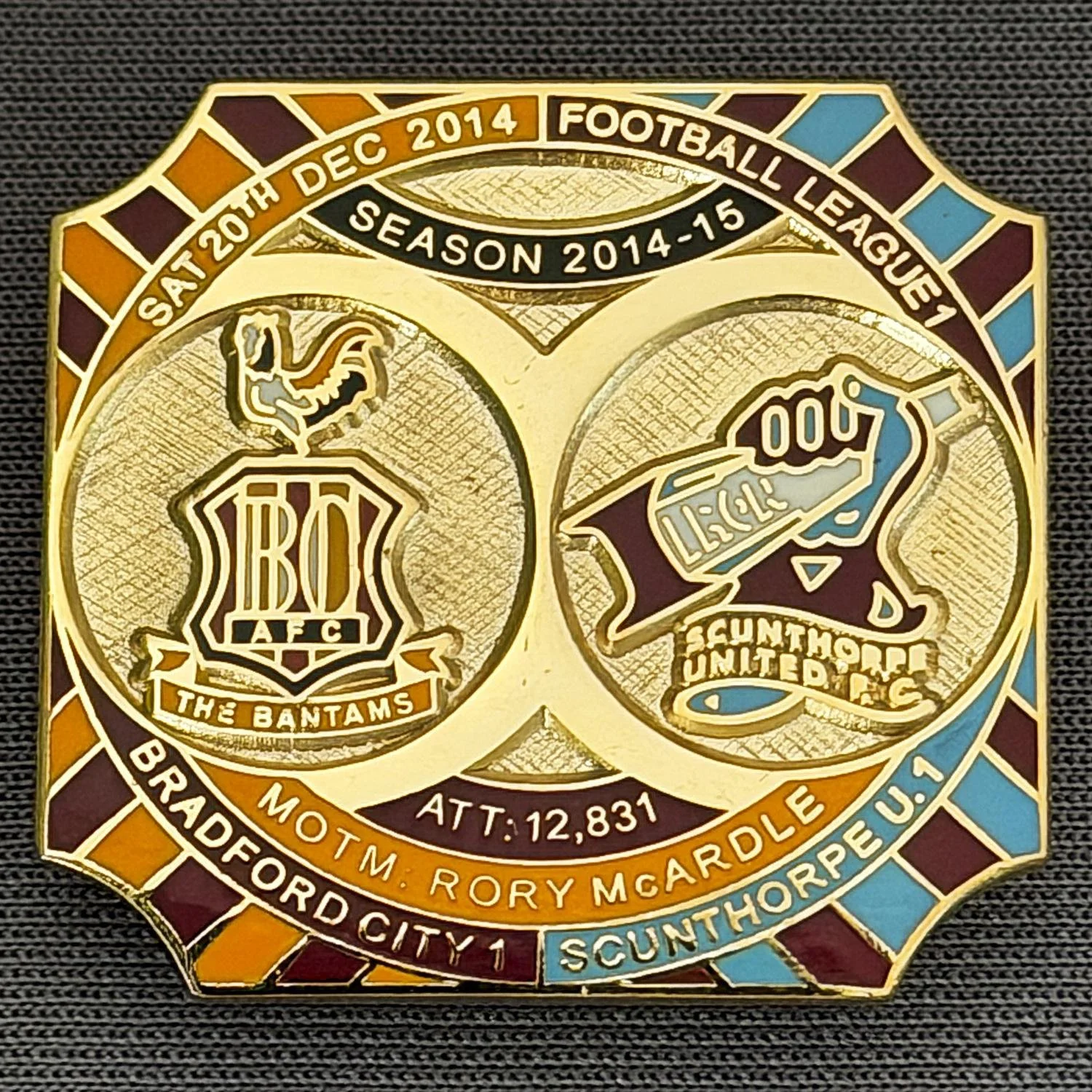 Reference Number: BCFIX265
Size: H 26.8 mm x W 28.8 mm
Pin Type: Brooch Pin
Plating: Gold
Value: £8
Manufacturer: Bradford City Badges
Comments: Bradford City v Scunthorpe United 2014/15, Limited Edition of 50 Badges (Gold Version)