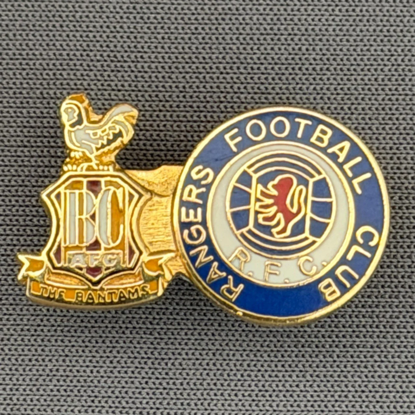 Reference Number: BCUN008
Size: H 13 mm x W 21.9 mm
Pin Type: Brooch Pin
Plating: Gold
Value: £8
Manufacturer: Not Known
Comments: City Rangers Twin Badge