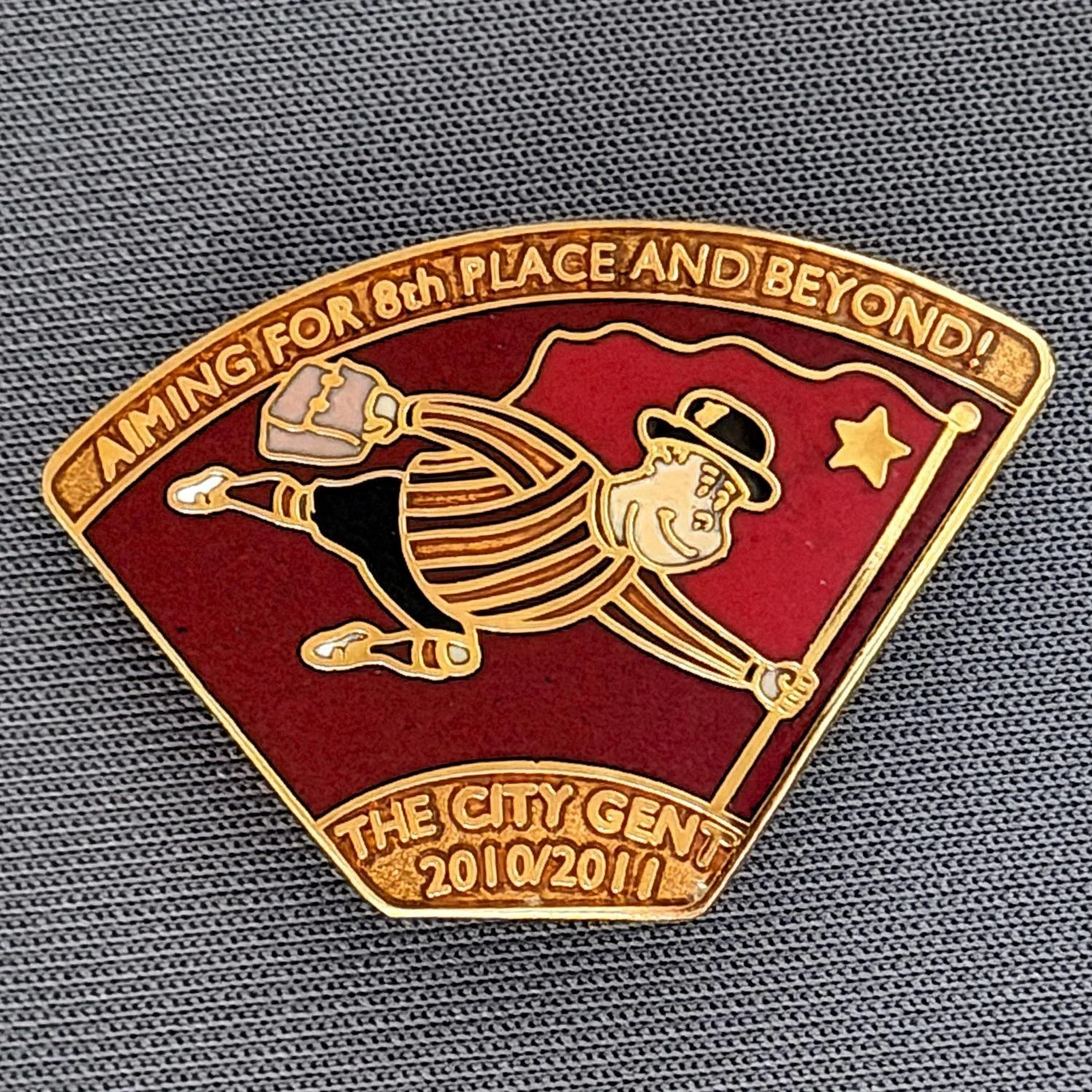 Reference Number: BCGEN045
Size: H 21.7 mm x W32.4 mm
Pin Type: Brooch Pin
Plating: Gold
Value: £10
Manufacturer: Bradford City Badges
Comments: City Gent Magazine 2010/11 Badge, Limited Edition of 100