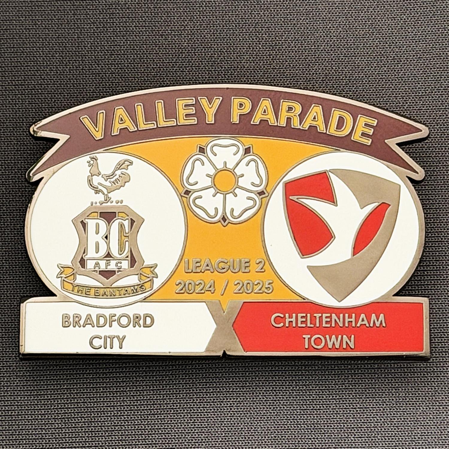 Reference Number: BCFIX433
Size: H 34.3 mm x W 50 mm
Pin Type: Brooch Pin
Plating: Black Nickel
Value: £5
Manufacturer: Unknown
Comments: Bradford City v Cheltenham Town 2024/25.