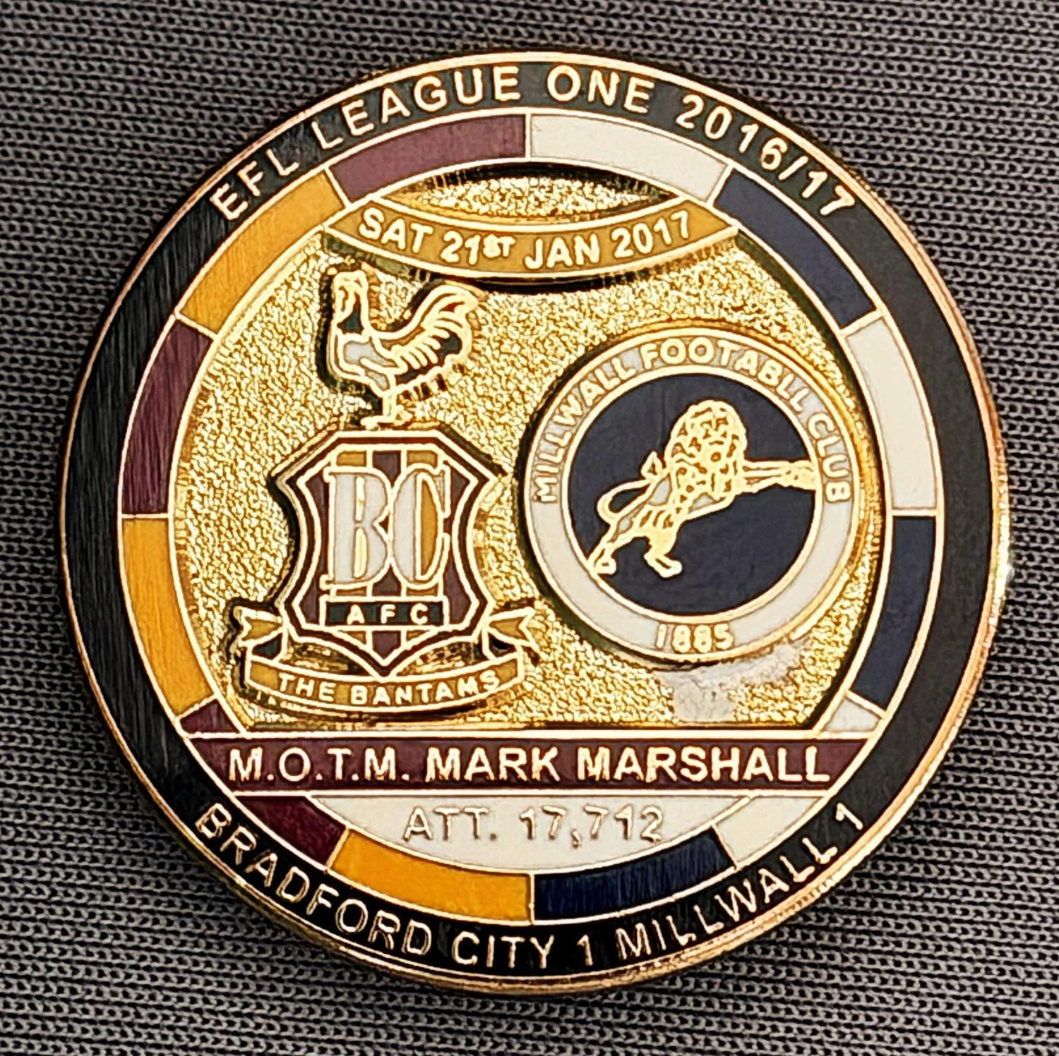 Reference Number: BCFIX383
Size: D 29.4 mm
Pin Type: Brooch Pin
Plating: Gold
Value: £8
Manufacturer: Bradford City Badges
Comments: Bradford City v Millwall 2015/16, Limited Edition of 50 Badges (Gold Version)