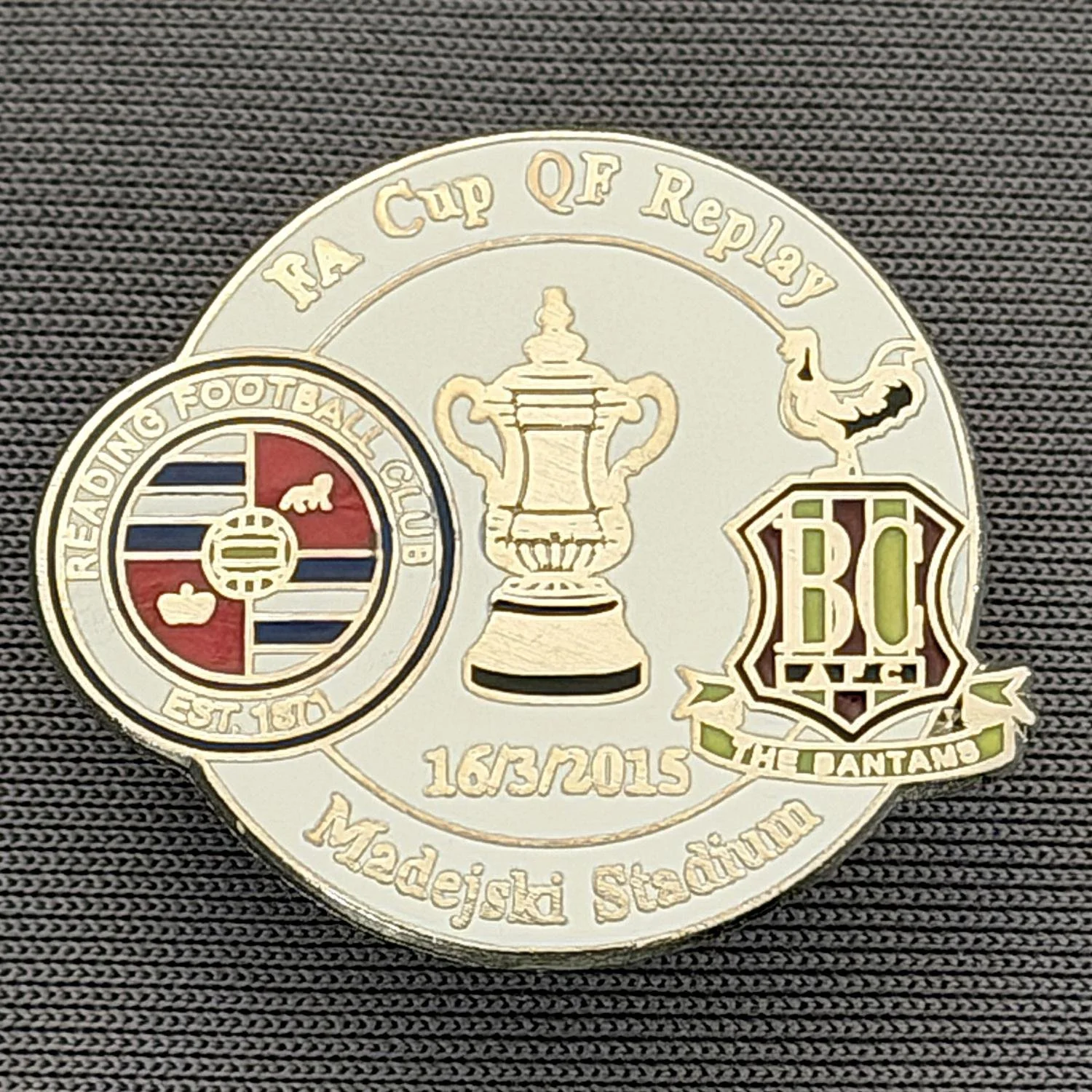 Reference Number: BCFAC128
Size: H 21.9 mm x W 26 mm
Pin Type: Metal Clutch
Plating: Silver
Value: £4
Manufacturer: Dan Lloyd
Comments: F.A. Cup Quarter Final Replay 2014/15, Away v Reading, White Version