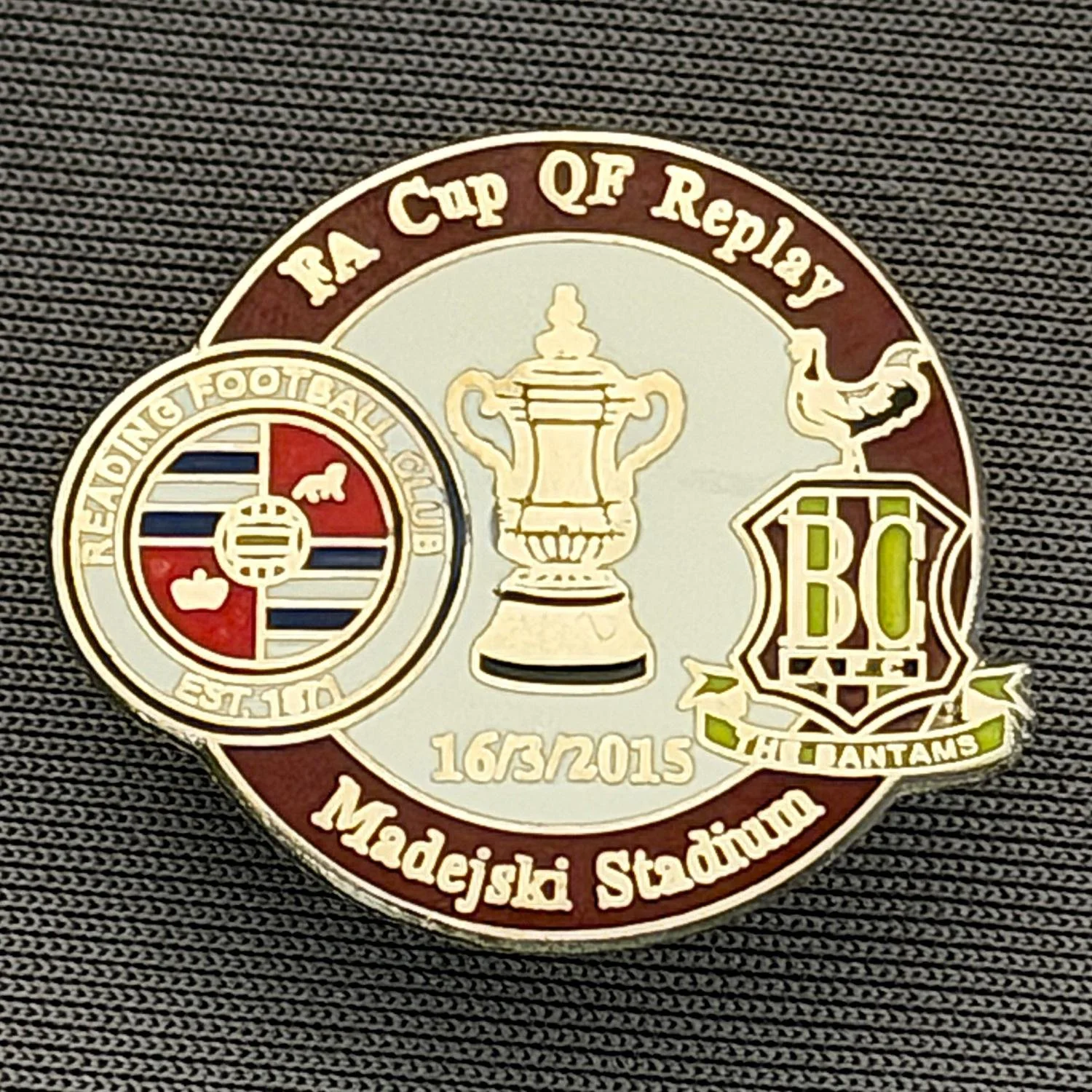 Reference Number: BCFAC126
Size: H 21.9 mm x W 26 mm
Pin Type: Metal Clutch
Plating: Silver
Value: £4
Manufacturer: Dan Lloyd
Comments: F.A. Cup Quarter Final Replay 2014/15, Away v Reading, Claret & White Version