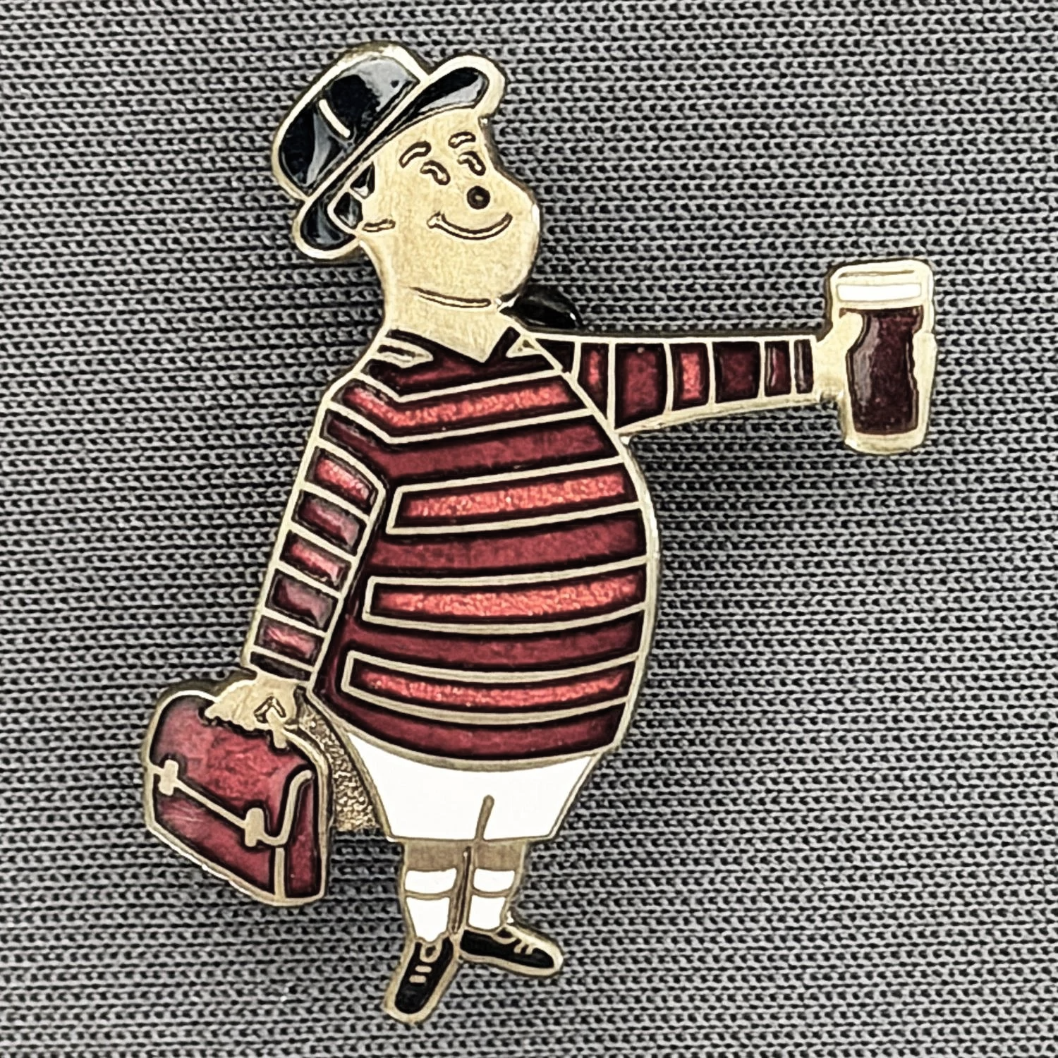 Reference Number: BCGEN054
Size: H 28.8 mm x W 20.9 mm
Pin Type: Brooch Pin
Plating: Antique Silver
Value: £15
Manufacturer: Bradford City Badges
Comments: City Gent Beer Cloisonne, Amber Briefcase. Limited Edition Set of 15.