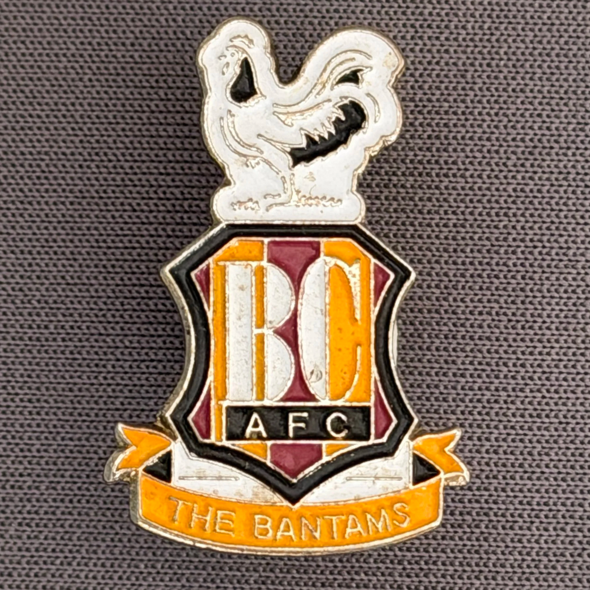 Reference Number: BCC&L078
Size: H 24.9 mm x 16.8  mm
Pin Type: Brooch Pin
Plating: Gold
Value: £8
Manufacturer: Unknown
Comments: Classic BCAFC Logo
