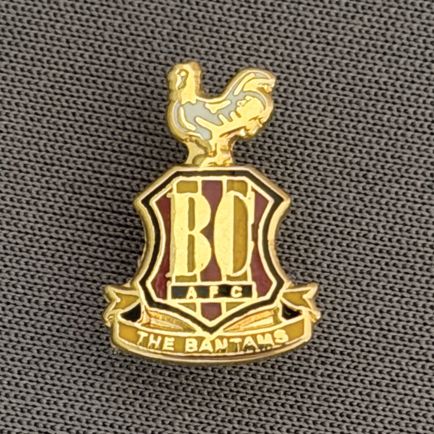 Reference Number: BCC&L080
Size: H 14.6 mm x 10.4  mm
Pin Type: Brooch Pin
Plating: Gold
Value: £8
Manufacturer: Unknown
Comments: Classic Tiny BCAFC Logo