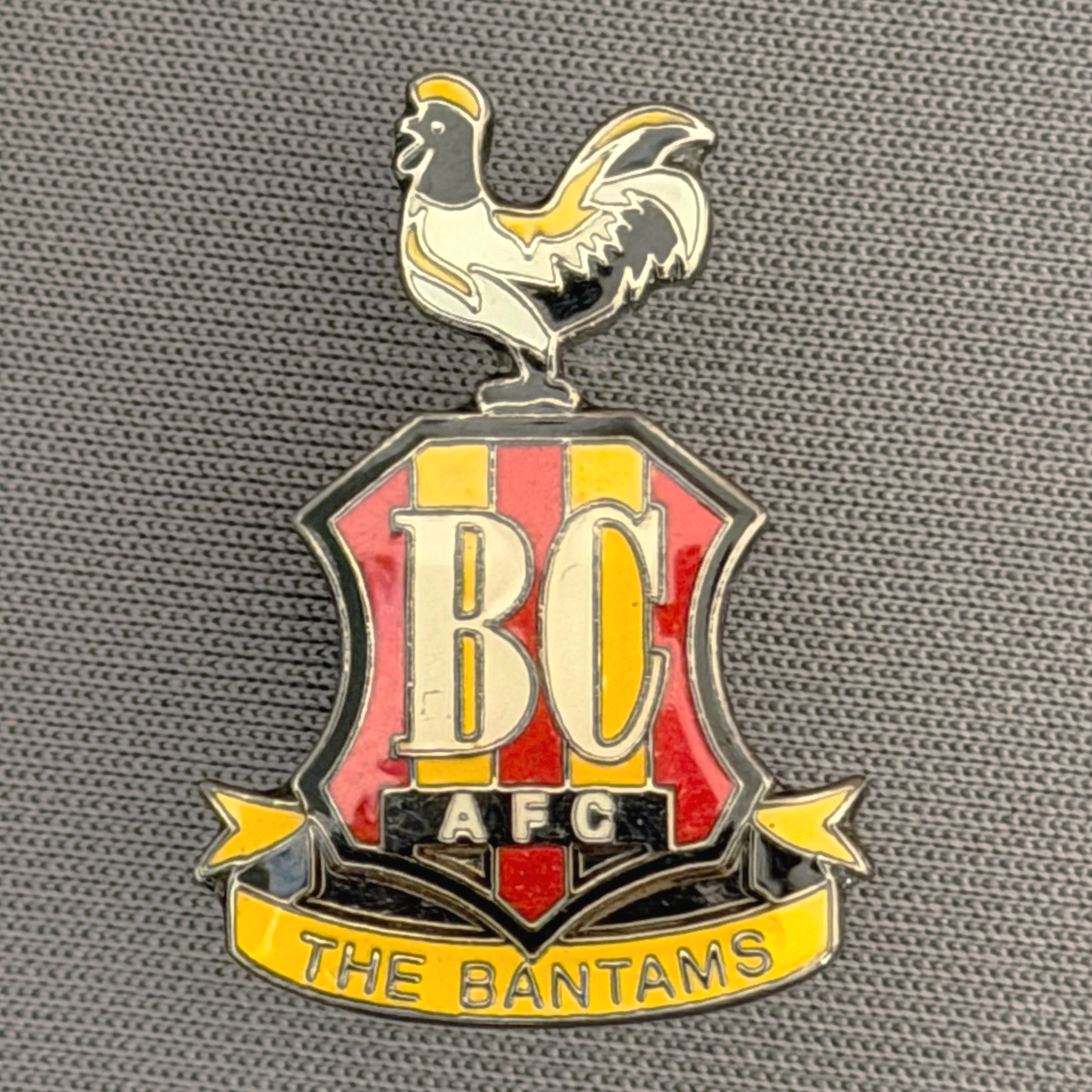 Reference Number: BCC&L082
Size: H 24.8 mm x 17.5  mm
Pin Type: Metal Clutch
Plating: Black Nickel
Value: £8
Manufacturer: Unknown
Comments: Classic BCAFC Logo