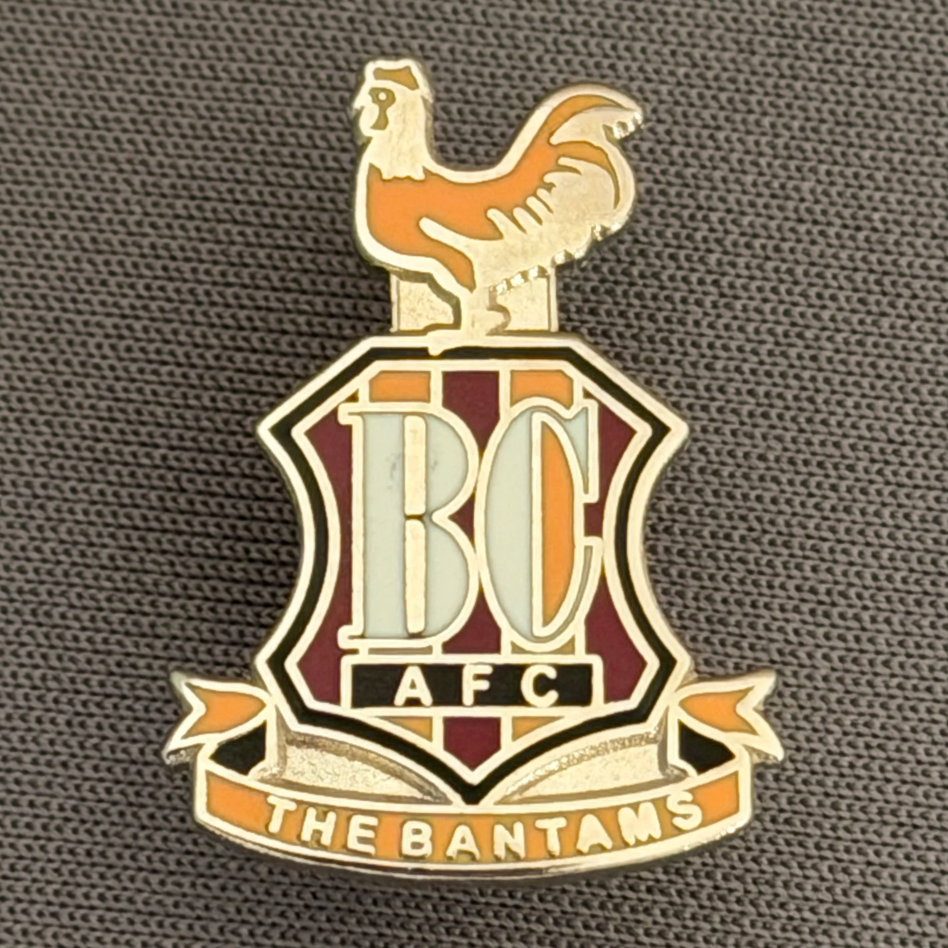 Reference Number: BCC&L087
Size: H 22.4 mm x 16.3  mm
Pin Type: Brooch Pin
Plating: Silver
Value: £8
Manufacturer: Unknown
Comments: Classic BCAFC Logo