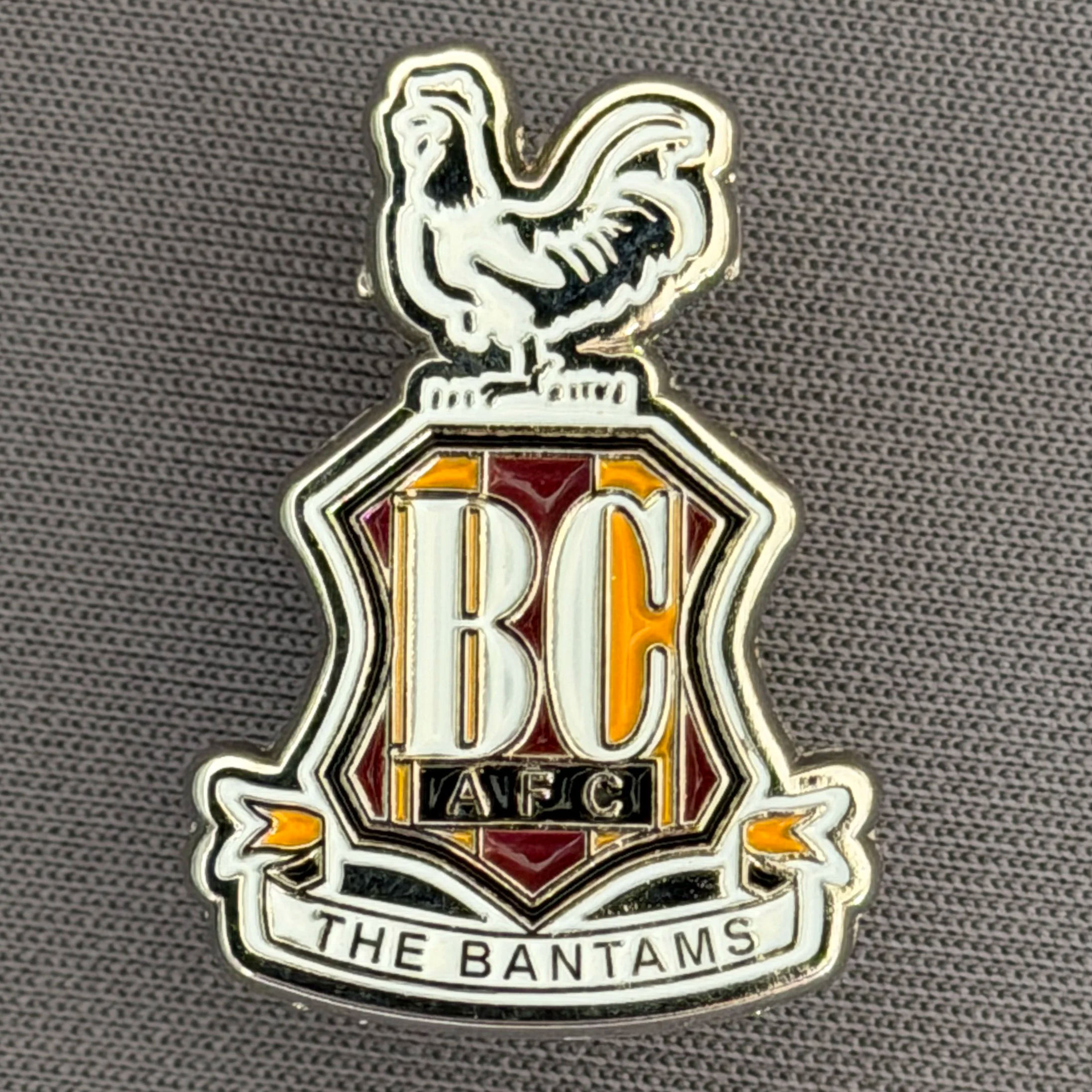 Reference Number: BCC&L088
Size: H 25.6 mm x 17.9  mm
Pin Type: Metal Clutch
Plating: Silver
Value: £8
Manufacturer: Unknown
Comments: Classic BCAFC Logo