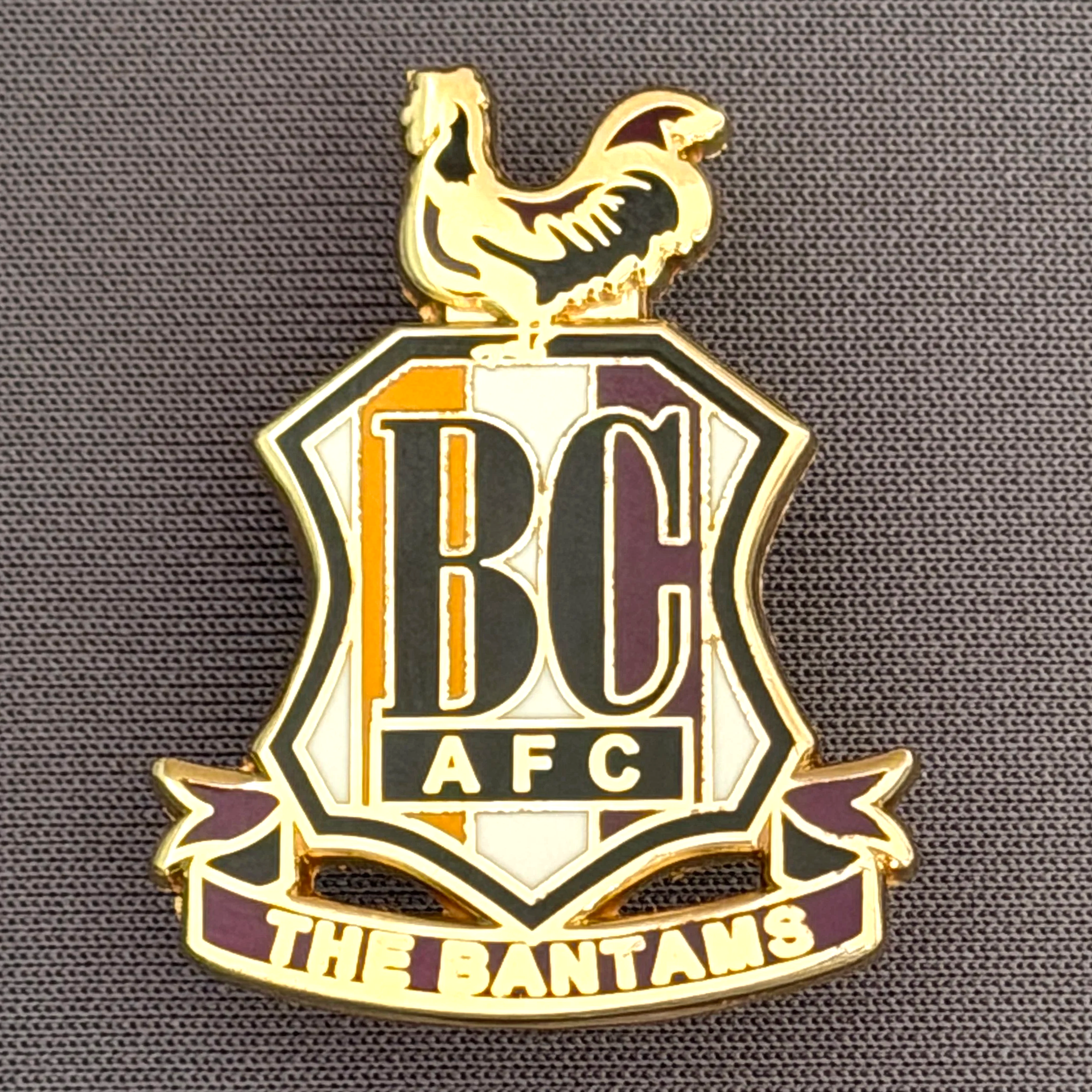 Reference Number: BCC&L093
Size: H 32.9 mm x 25.5  mm
Pin Type: Brooch Pin
Plating: Gold
Value: £6
Manufacturer: Unknown
Comments: Classic BCAFC Logo Variant