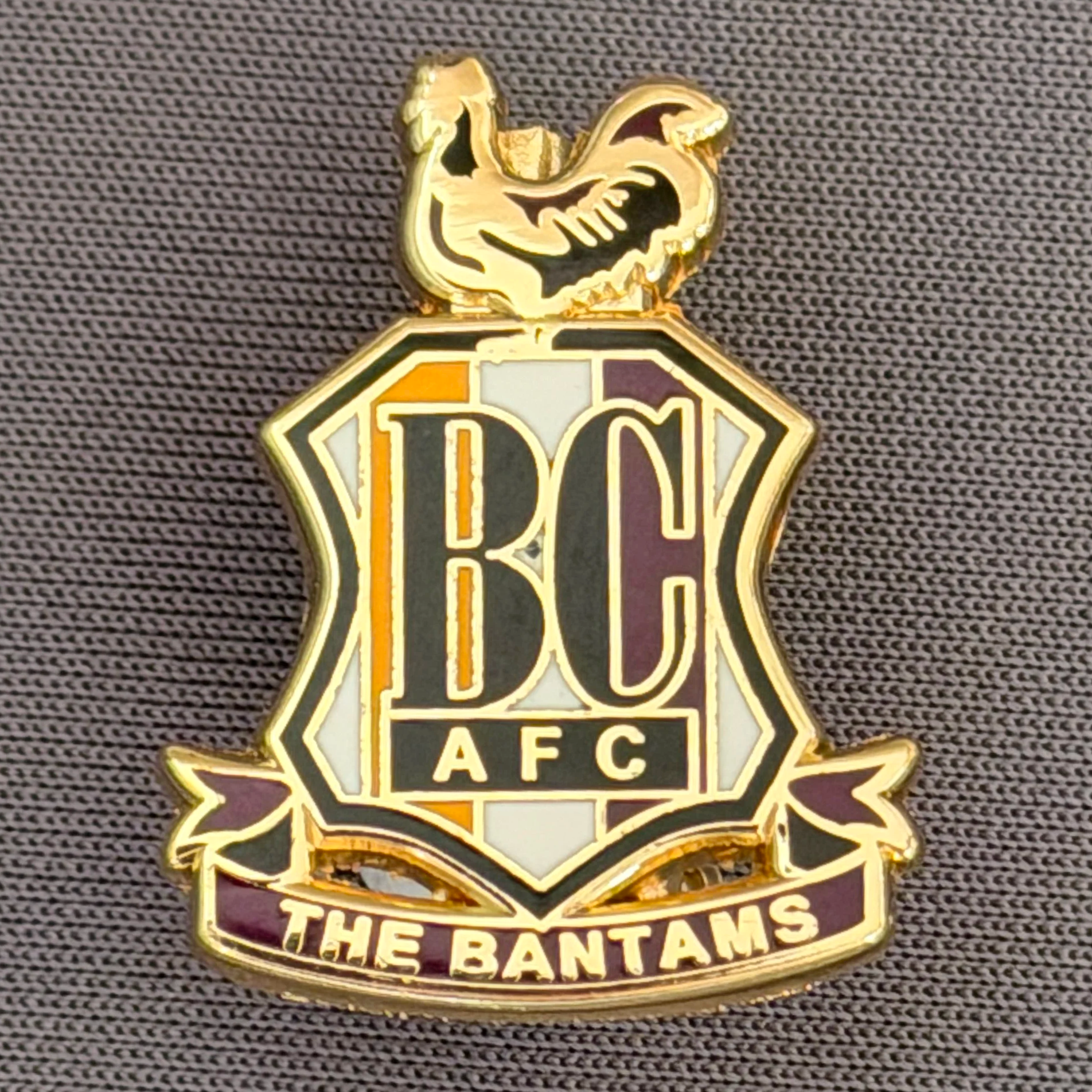 Reference Number: BCC&L096
Size: H 24.9 mm x 19.4  mm
Pin Type: Brooch Pin
Plating: Gold
Value: £6
Manufacturer: Unknown
Comments: Classic BCAFC Logo Small Variant