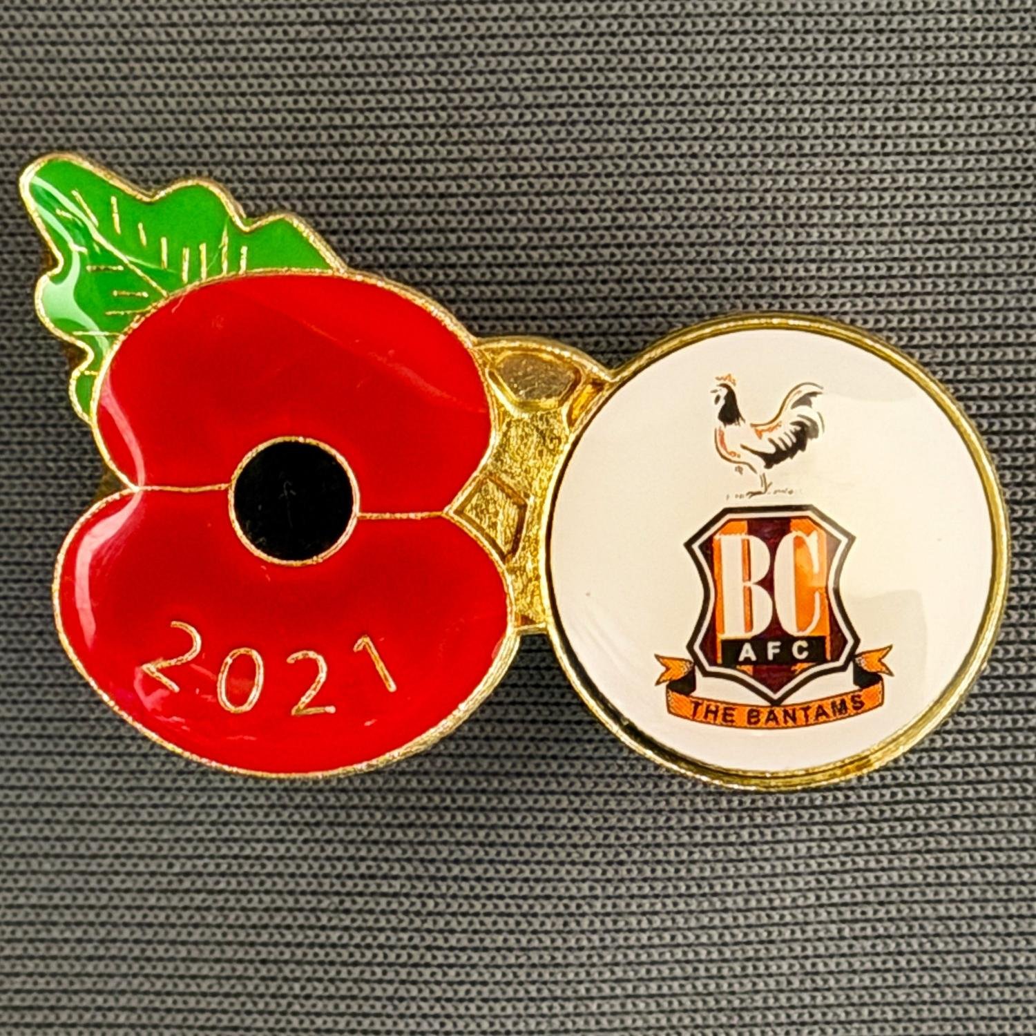 Reference Number: BCPOP002
Size: H 22.5 mm x W 34.9 mm
Pin Type: Metal Clutch
Plating: Gold
Value: £6
Manufacturer: Royal British Legion
Comments: Bradford City Poppy 2021

