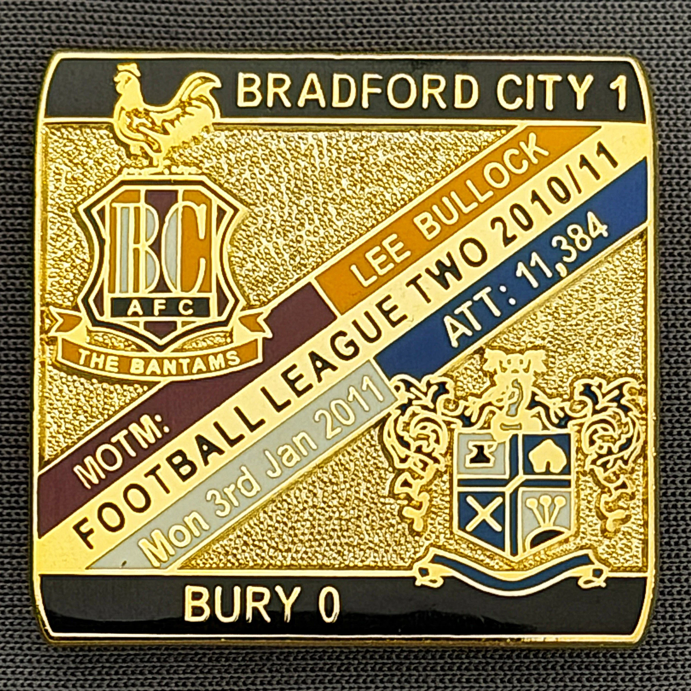 Reference Number: BCFIX057
Size: H 28.3 mm x W 29.3 mm
Pin Type: Brooch Pin
Plating: Gold
Value: £8
Manufacturer: Bradford City Badges
Comments: Bradford City v Bury  2010/11 Limited Edition 100 Badges