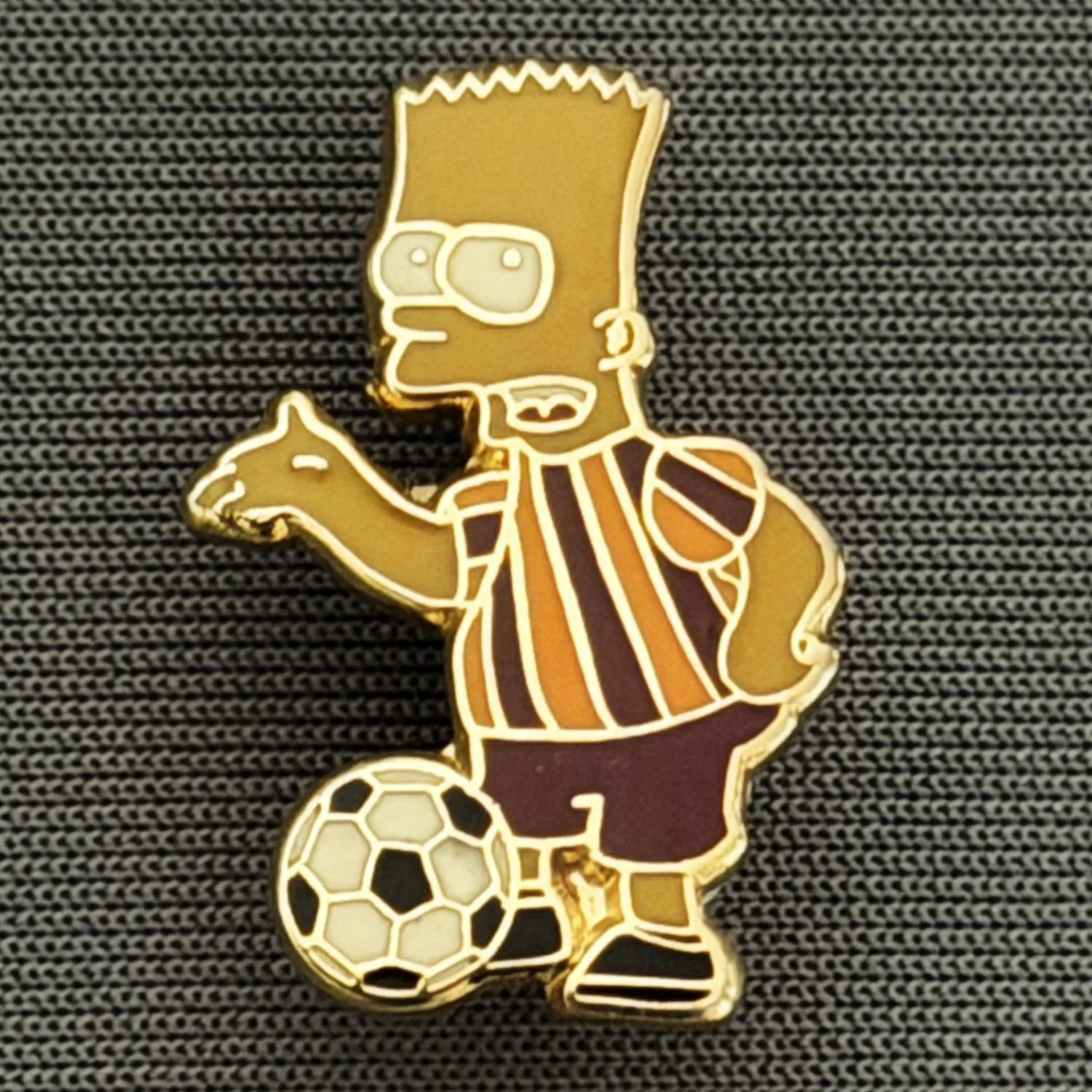 Reference Number: BCCTN007
Size: H 22.5 mm x W 14.2 mm
Pin Type: Brooch Pin
Plating: Gold
Value: £6
Manufacturer: Not Known
Comments: Bart Simpson in Bradford City Kit