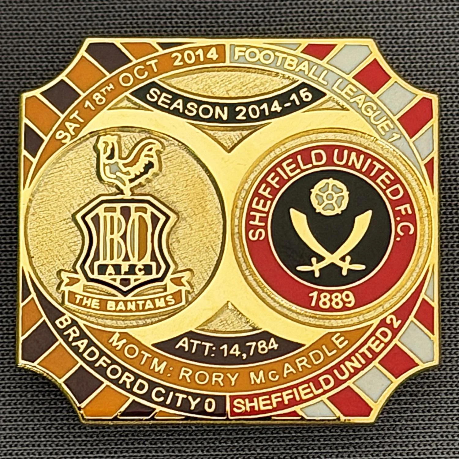 Reference Number: BCFIX260
Size: H 26.8 mm x W 28.8 mm
Pin Type: Brooch Pin
Plating: Gold
Value: £8
Manufacturer: Bradford City Badges
Comments: Bradford City v Sheffield United 2014/15, Limited Edition of 50 Badges (Gold Version)