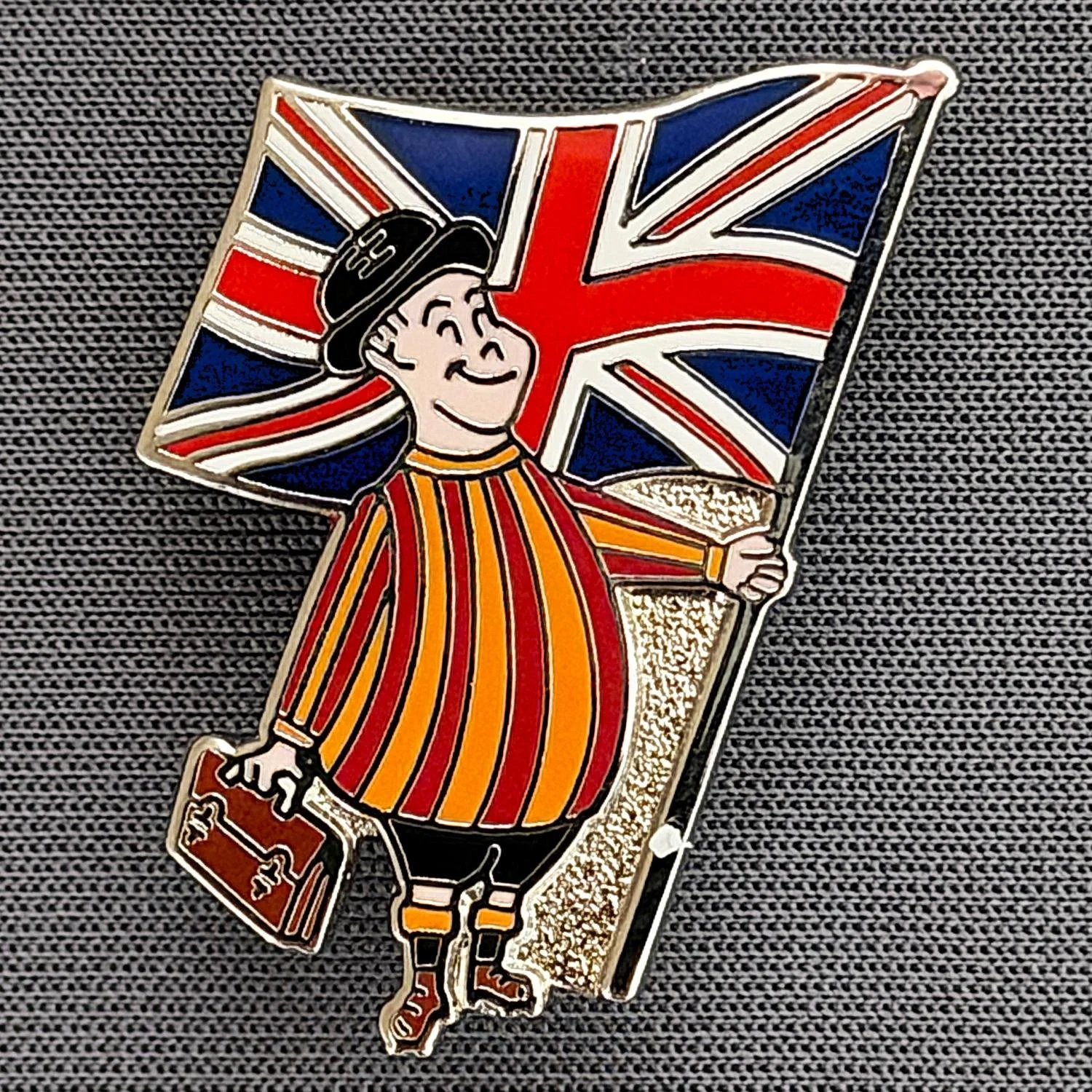 Reference Number: BCGEN039
Size: H 31.7 mm x W 18.6 mm
Pin Type: Brooch Pin
Plating: Silver
Value: £8
Manufacturer: Paraders
Comments: City Gent, Union Flags. Badge also Feature in Flags Section