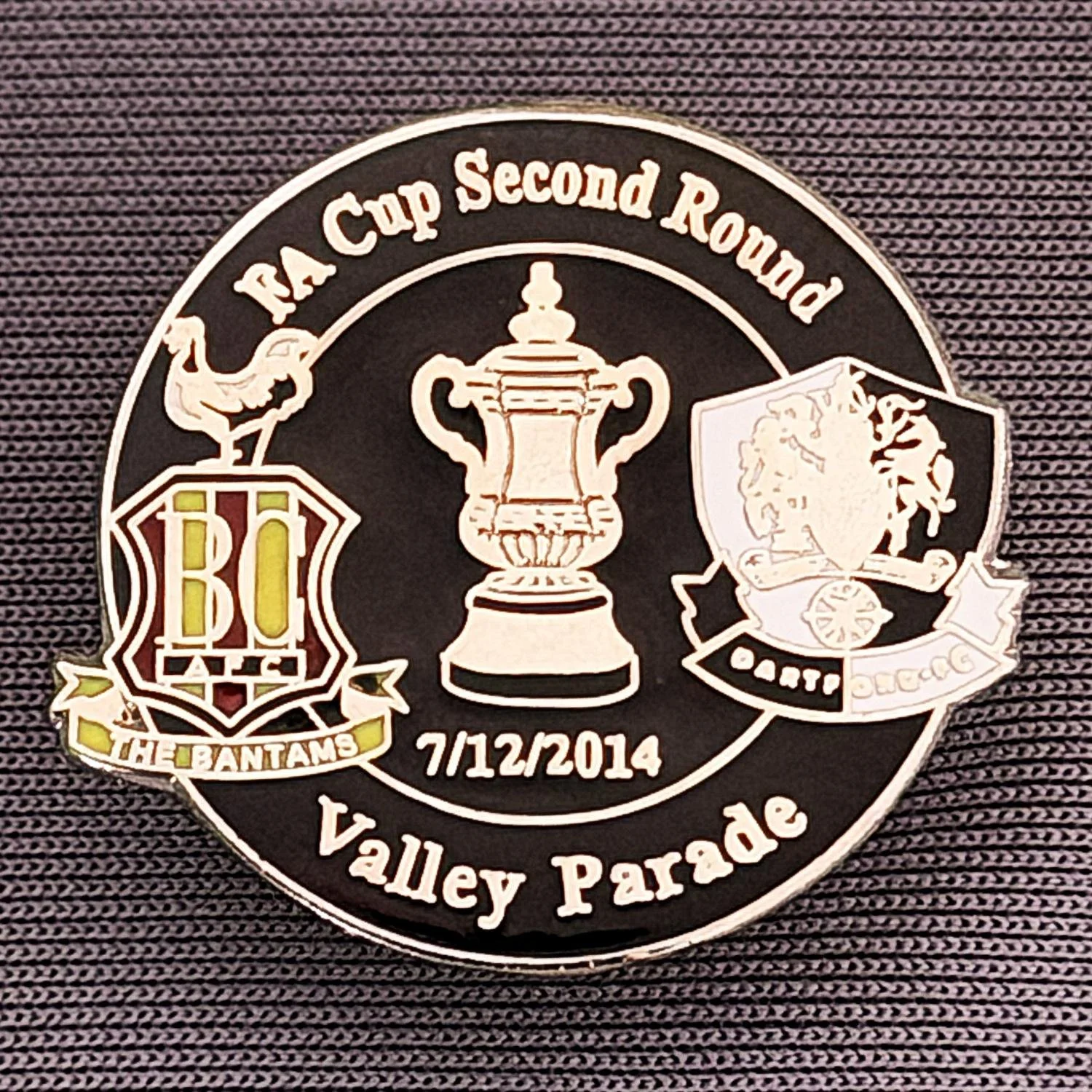 Reference Number: BCFAC069
Size: H 23.3 mm x W 25.6 mm
Pin Type: Metal Clutch
Plating: Silver
Value: £4
Manufacturer: Dan Lloyd
Comments: F.A. Cup Second Round 2014/15, v Dartford, Black Version