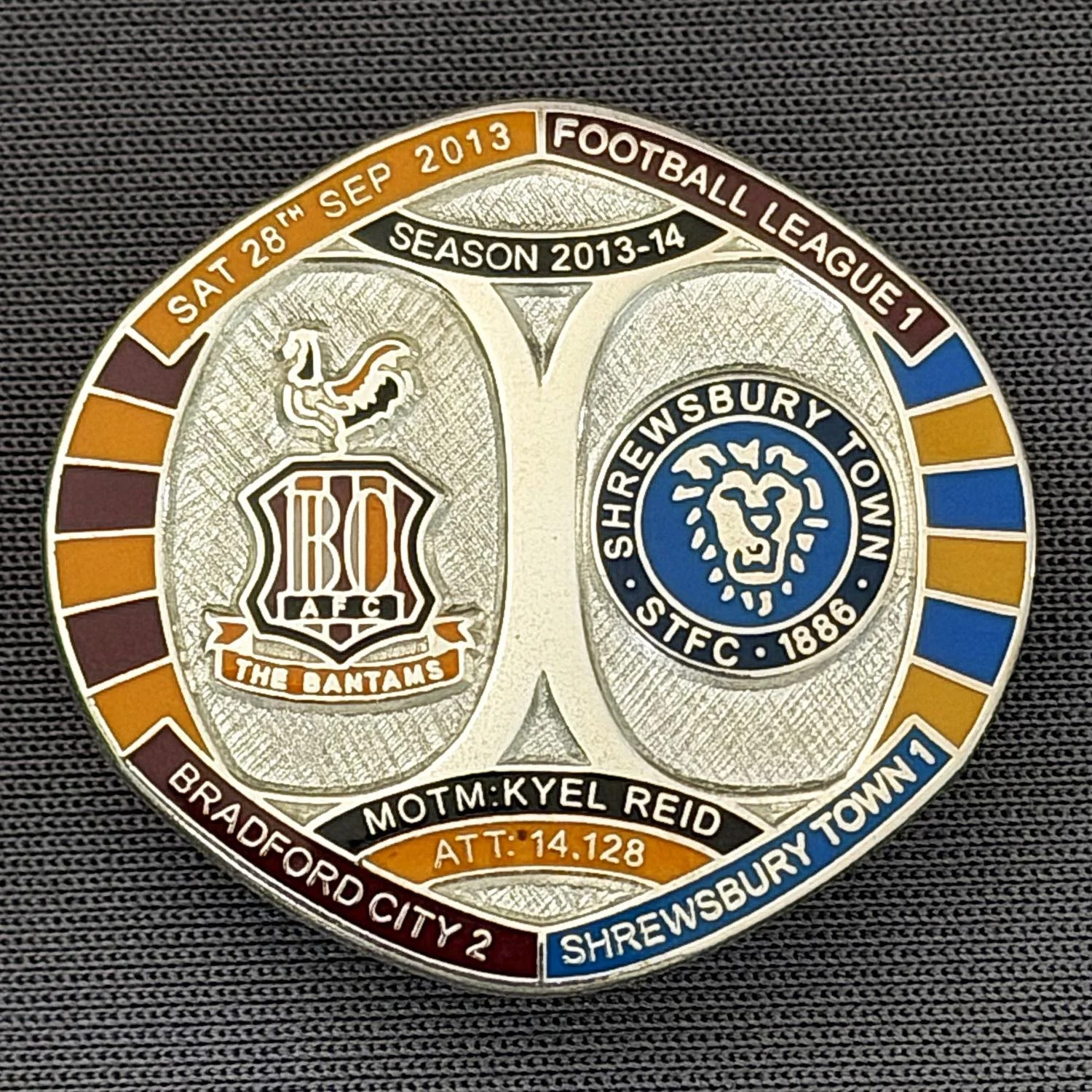 Reference Number: BCFIX212
Size: H 26.3 mm x W 28.9 mm
Pin Type: Brooch Pin
Plating: Silver
Value: £10
Manufacturer: Bradford City Badges
Comments: Bradford City v Shrewsbury Town  2013/14 Limited Edition 10 Badges (Silver Version)