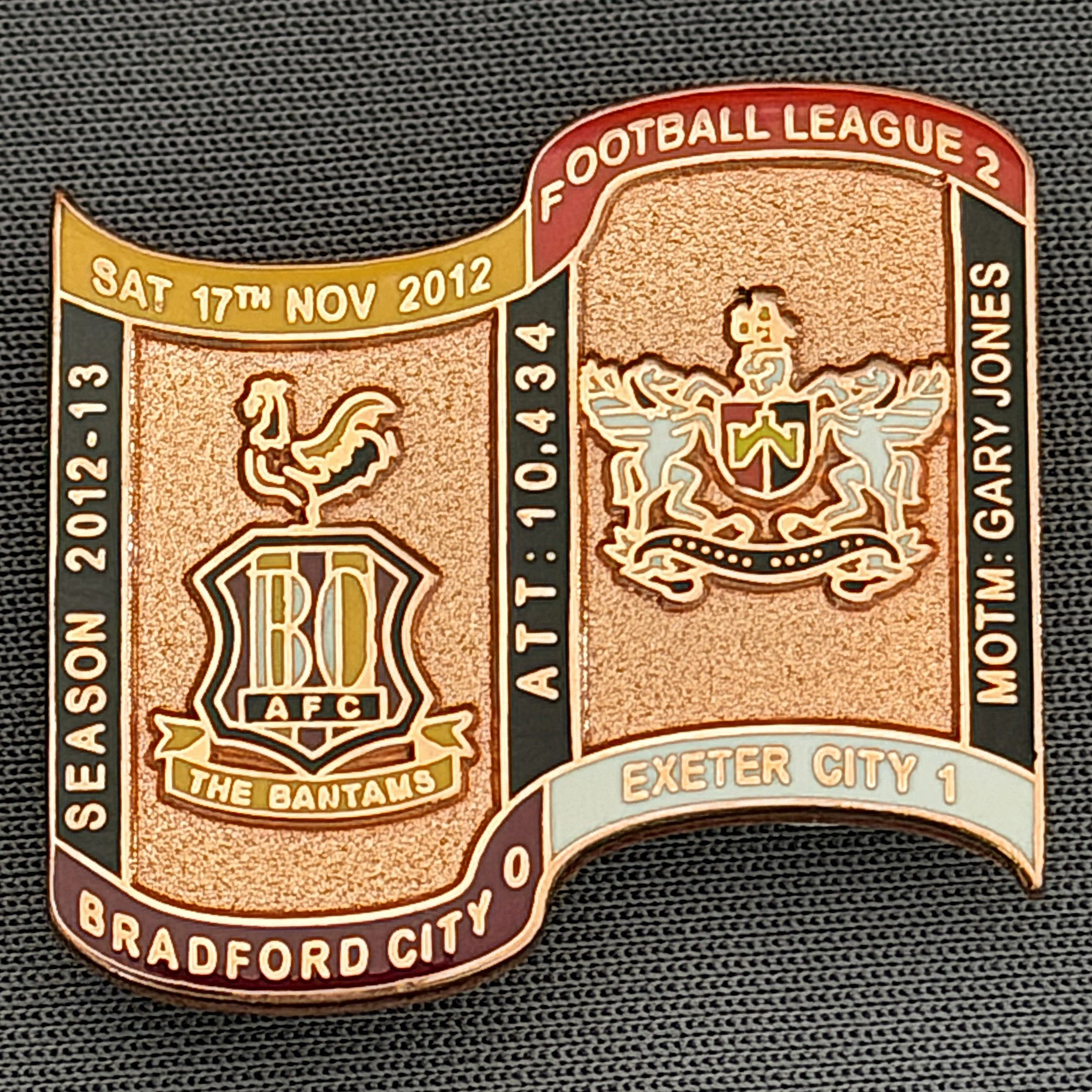 Reference Number: BCFIX170
Size: H 26.9 mm x W 29.2 mm
Pin Type: Brooch Pin
Plating: Copper
Value: £12
Manufacturer: Bradford City Badges
Comments: Bradford City v Exeter City 2012/13 Limited Edition 1 Badge (Copper Version)