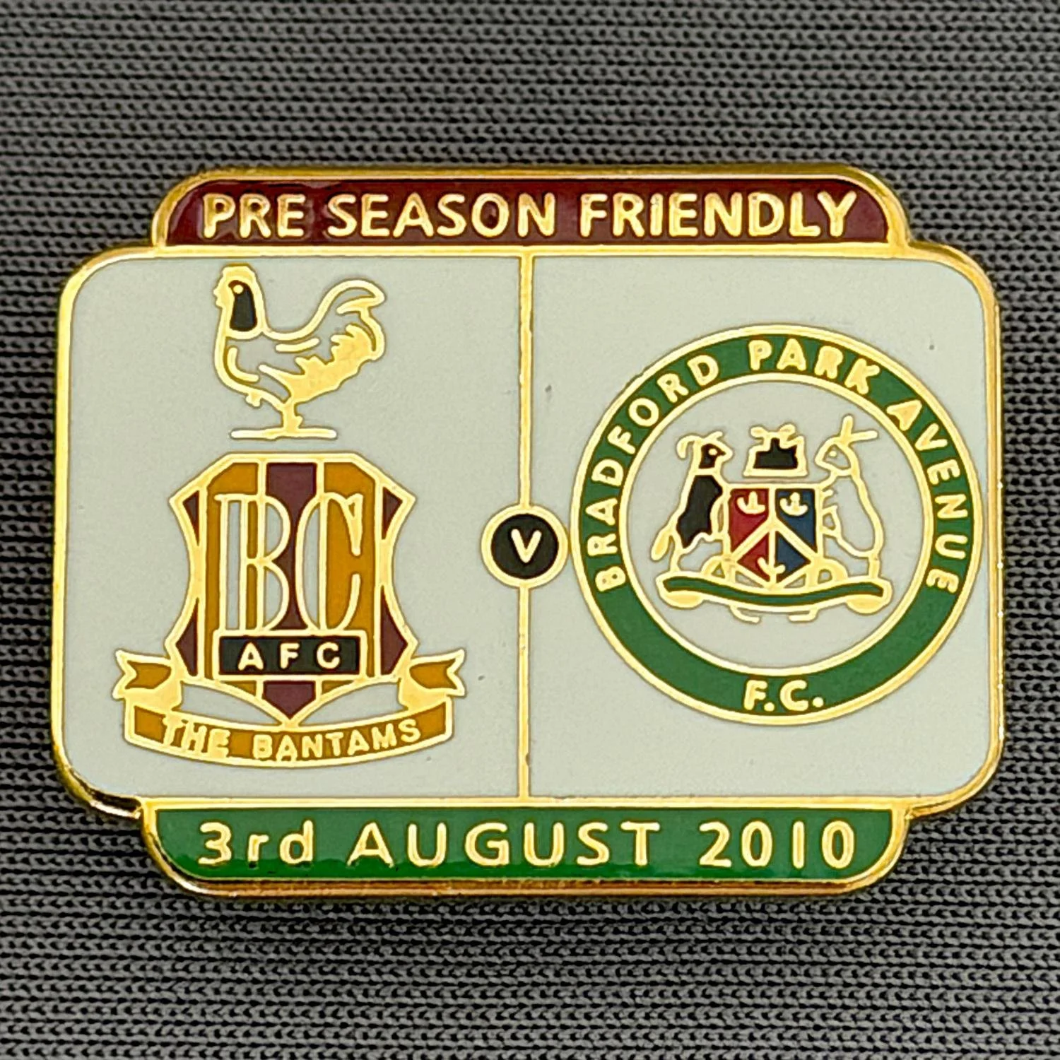 Reference Number: BCOFIX147
Size: H 20.5 mm x W 26.1 mm
Pin Type: Brooch Pin
Plating: Gold
Value: £5
Manufacturer: Unknown
Comments: Bradford City v Bradford Park Avenue Pre Season Friendly 2010